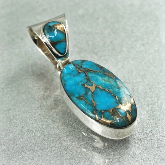 Vintage southwestern style sterling 925 silver oval pendant with turquoise