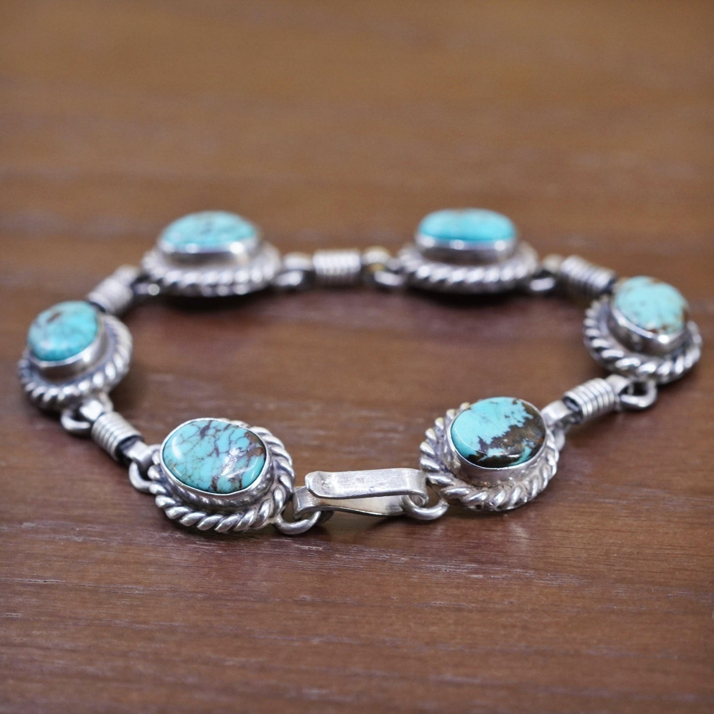 7.5”, southwestern Sterling 925 silver bracelet spiderwebbed turquoise cable