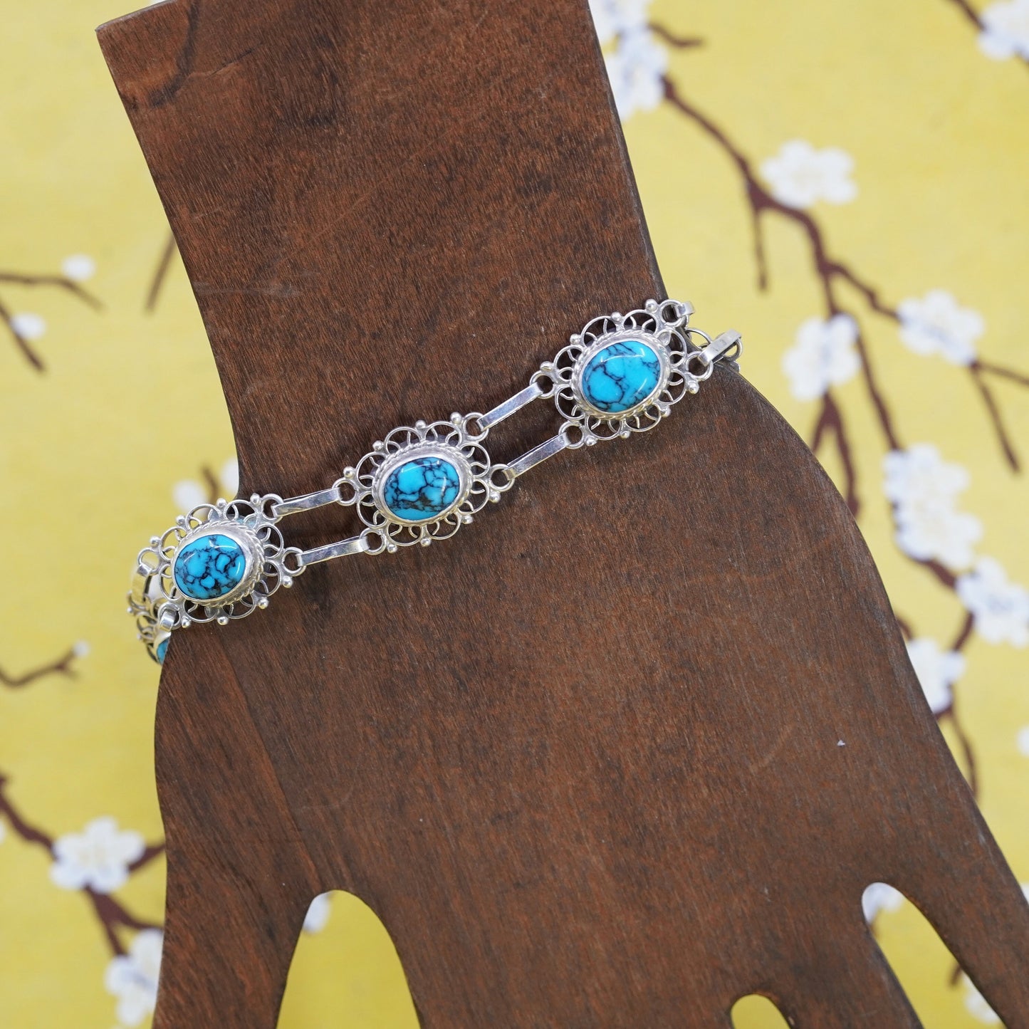 7.75”, mexico Sterling 925 silver filigree bracelet with spiderwebbed turquoise