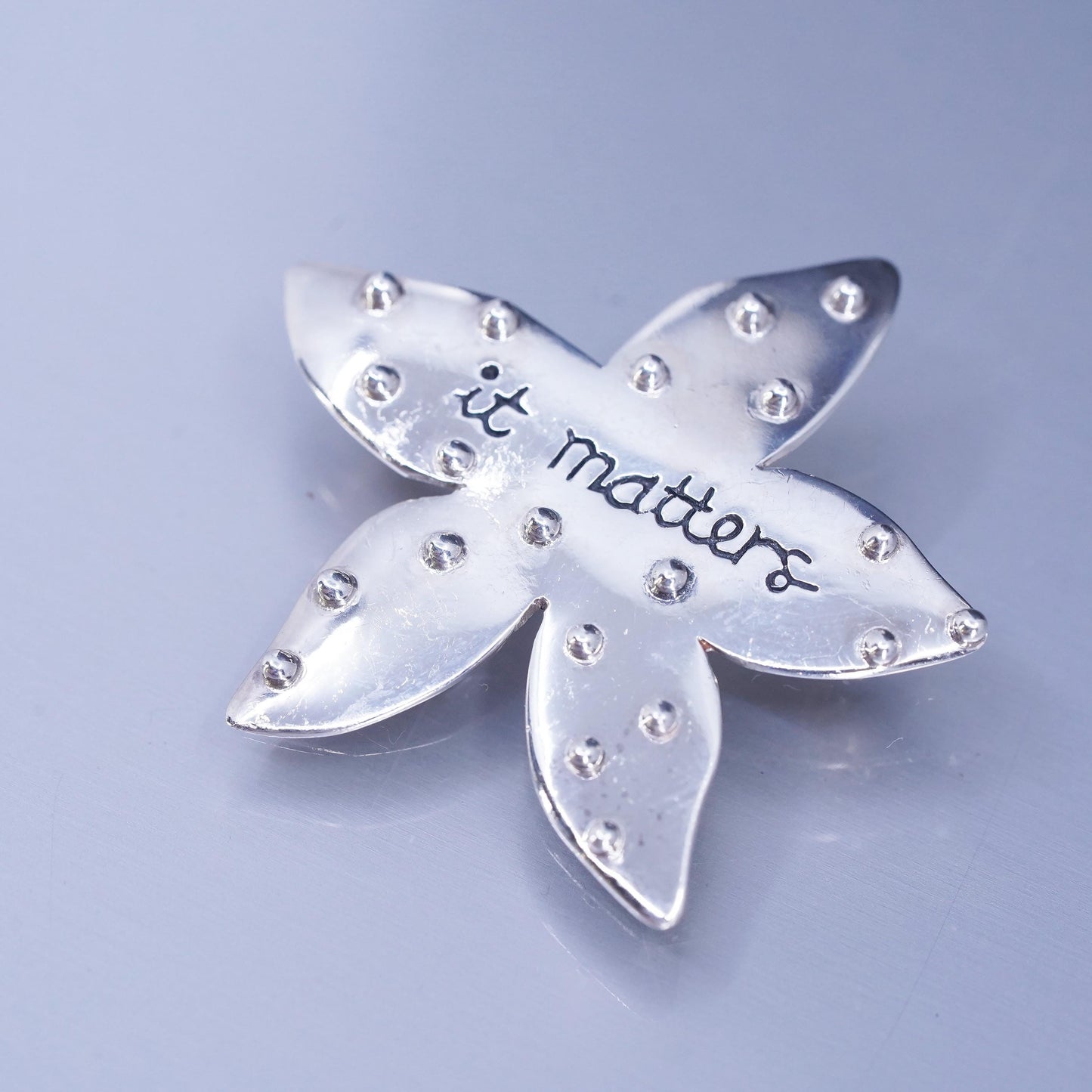 Baroni sterling silver brooch, 925 star starfish pin embossed “it matters”