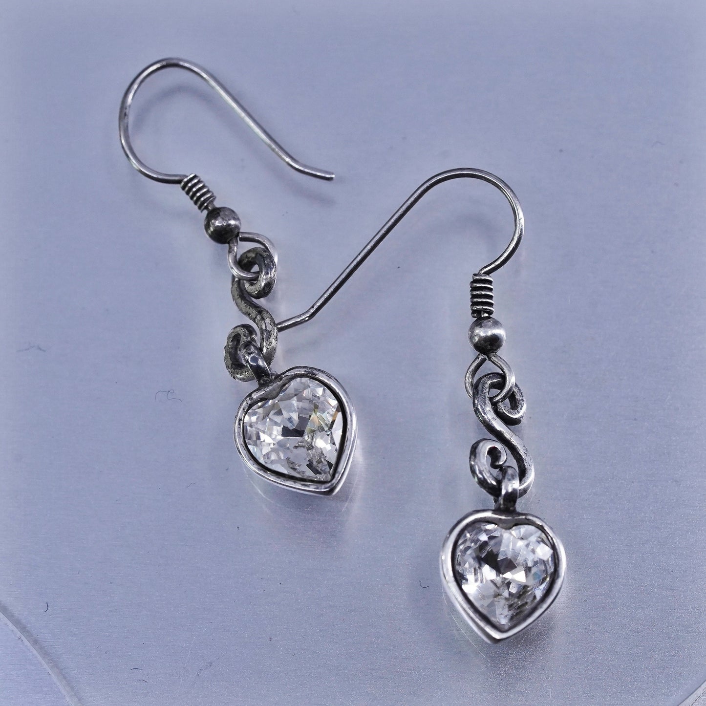 Vintage silver tone earrings with heart shaped cz