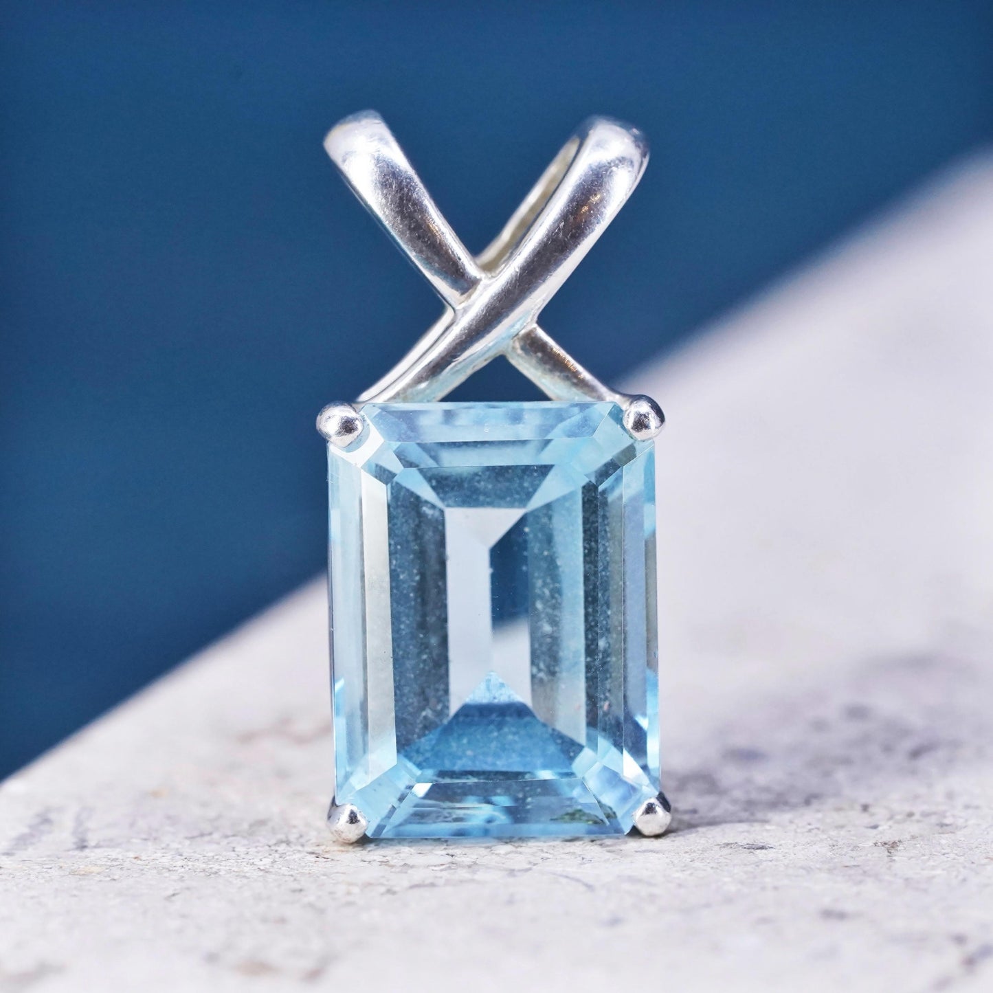 Vintage sterling 925 silver handmade pendant with emerald cut blue topaz