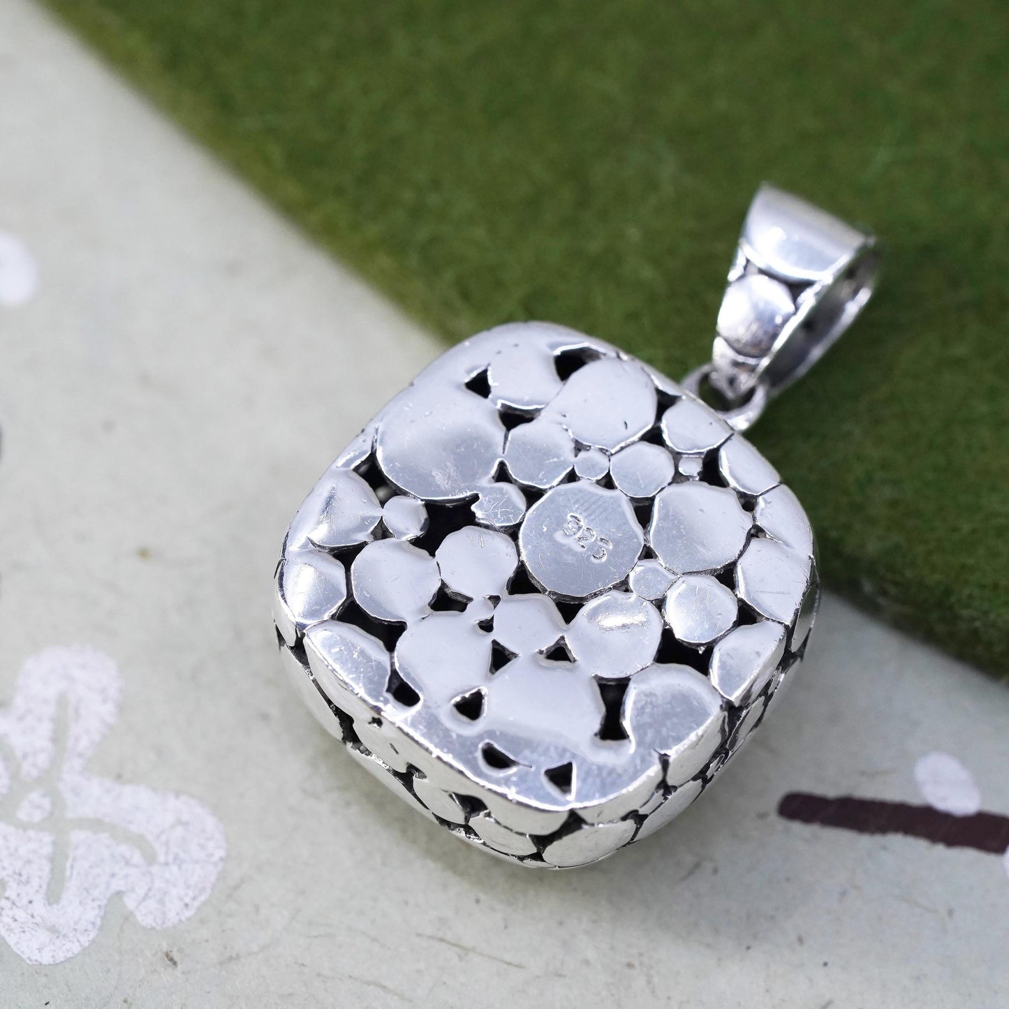 Sterling silver pendant, pebble textured 925 square with checkerboard cut onyx