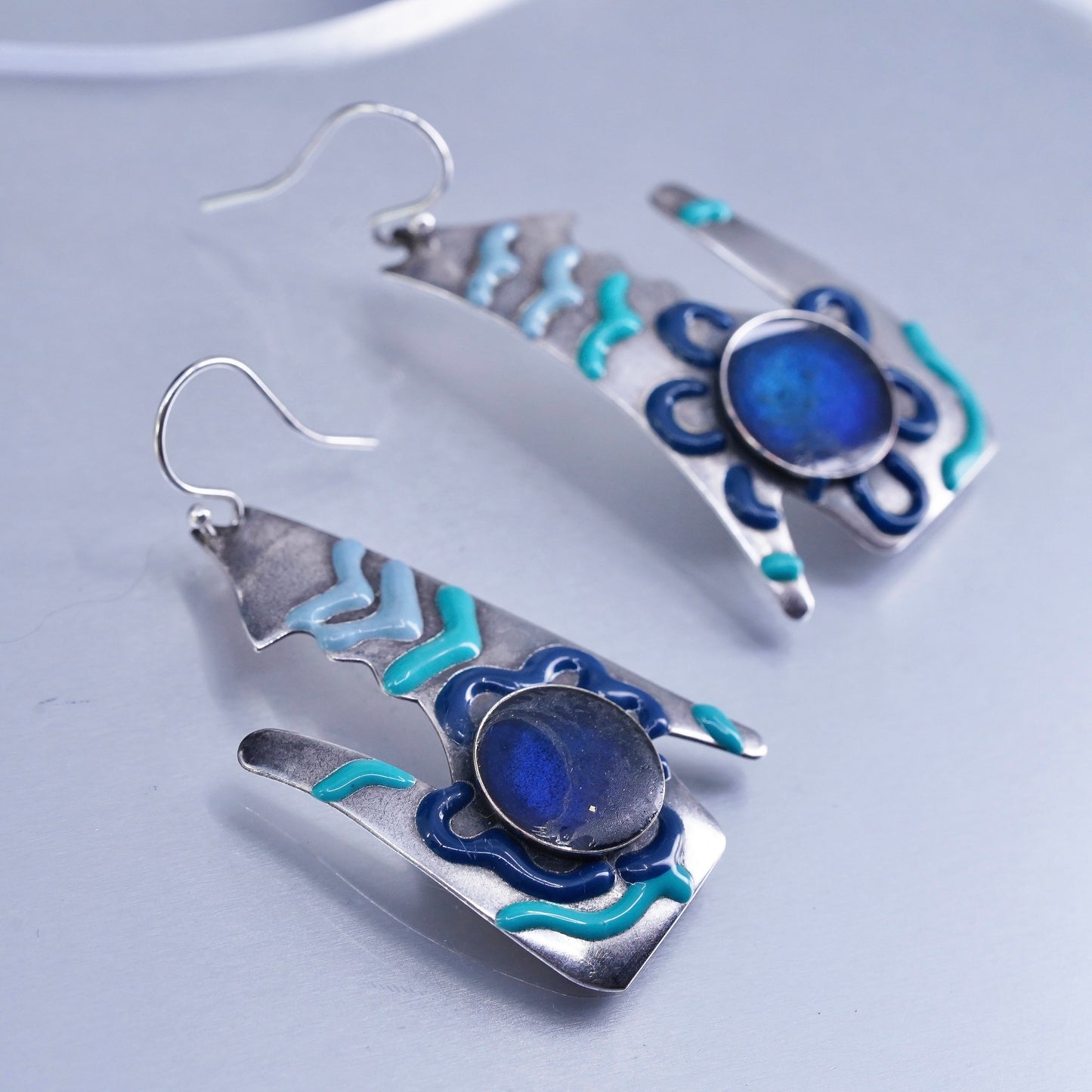 Vintage southwestern Sterling 925 silver wolf earrings with blue enamel inlay