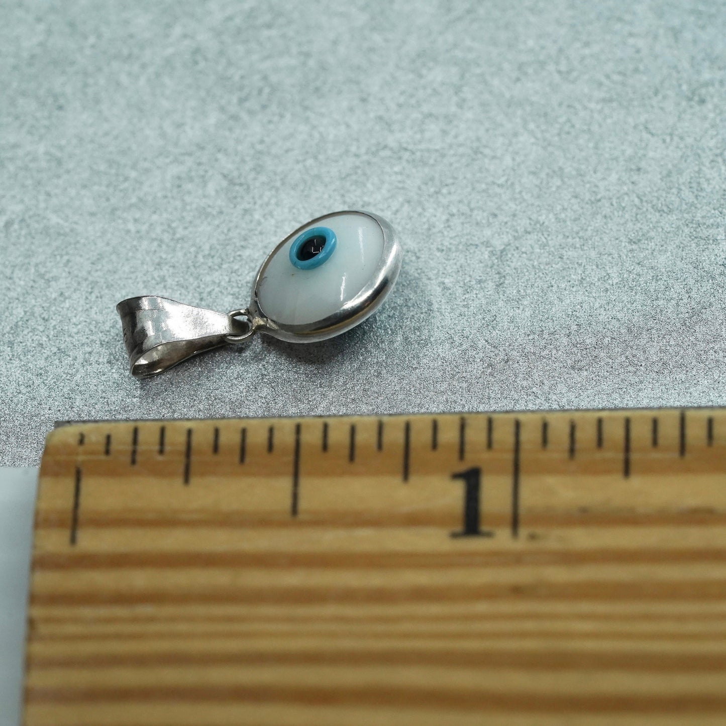 Vintage sterling 925 silver pendant with blue evil eye