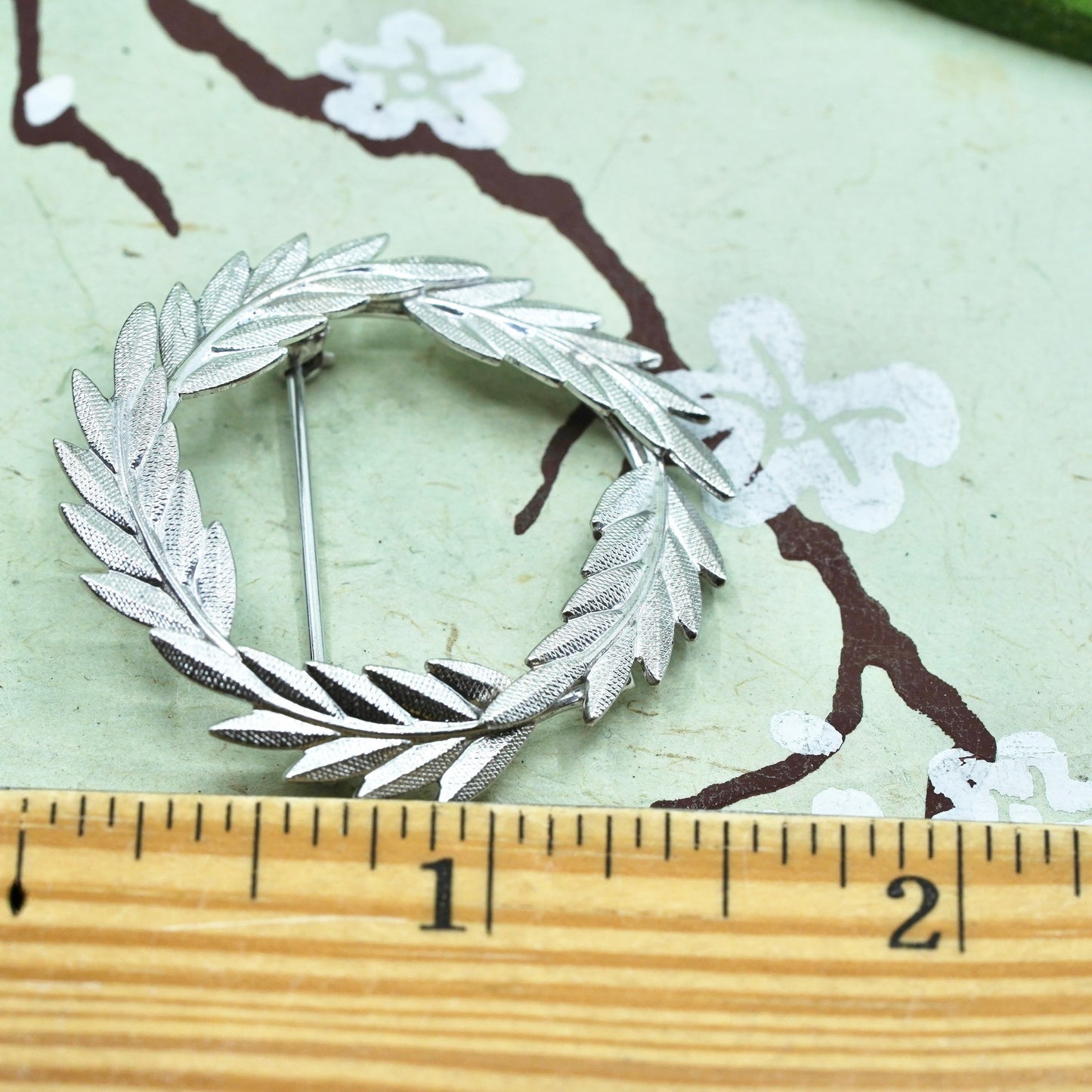 Vintage sterling silver handmade brooch, feather 925 circle, Christmas pin