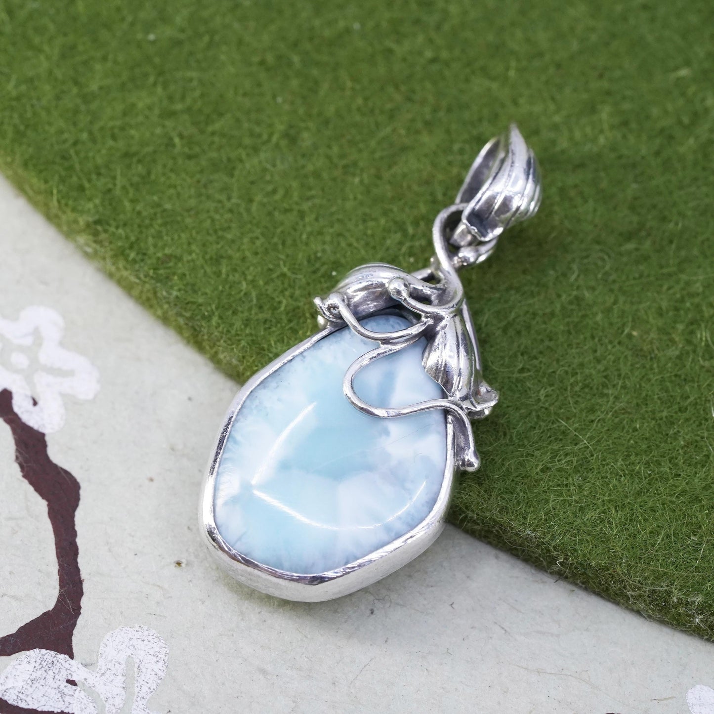 Vintage southwestern sterling 925 silver handmade pendant with Larimar leaves