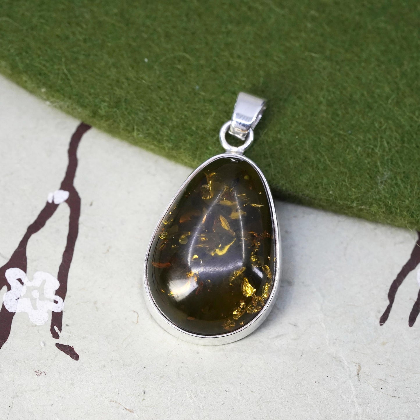 Vintage sterling 925 silver handmade pendant with teardrop amber