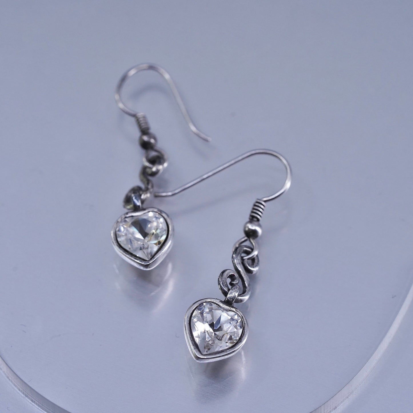 Vintage silver tone earrings with heart shaped cz