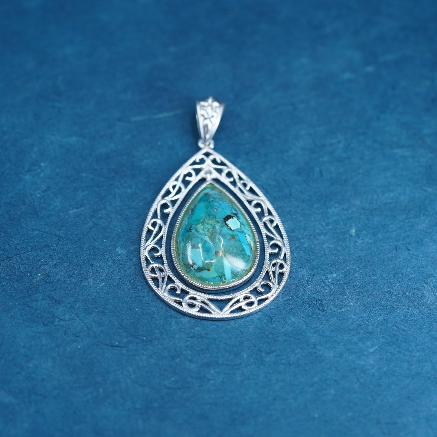 southwestern Sterling 925 silver handmade teardrop pendant with turquoise