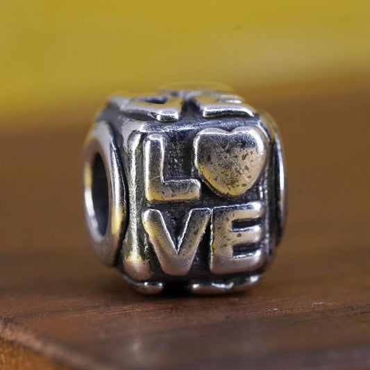 Vintage Sterling silver handmade pendant, 925 bead charm embossed “love”