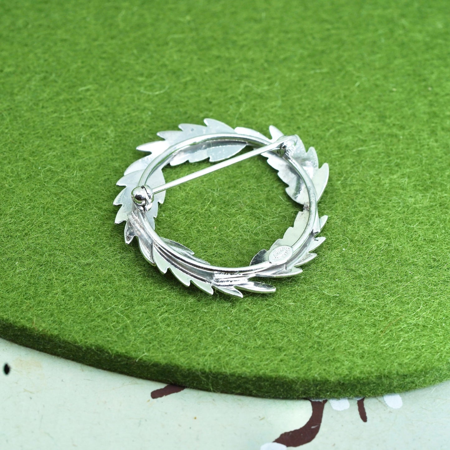 Vintage sterling silver handmade brooch, feather 925 circle, Christmas pin