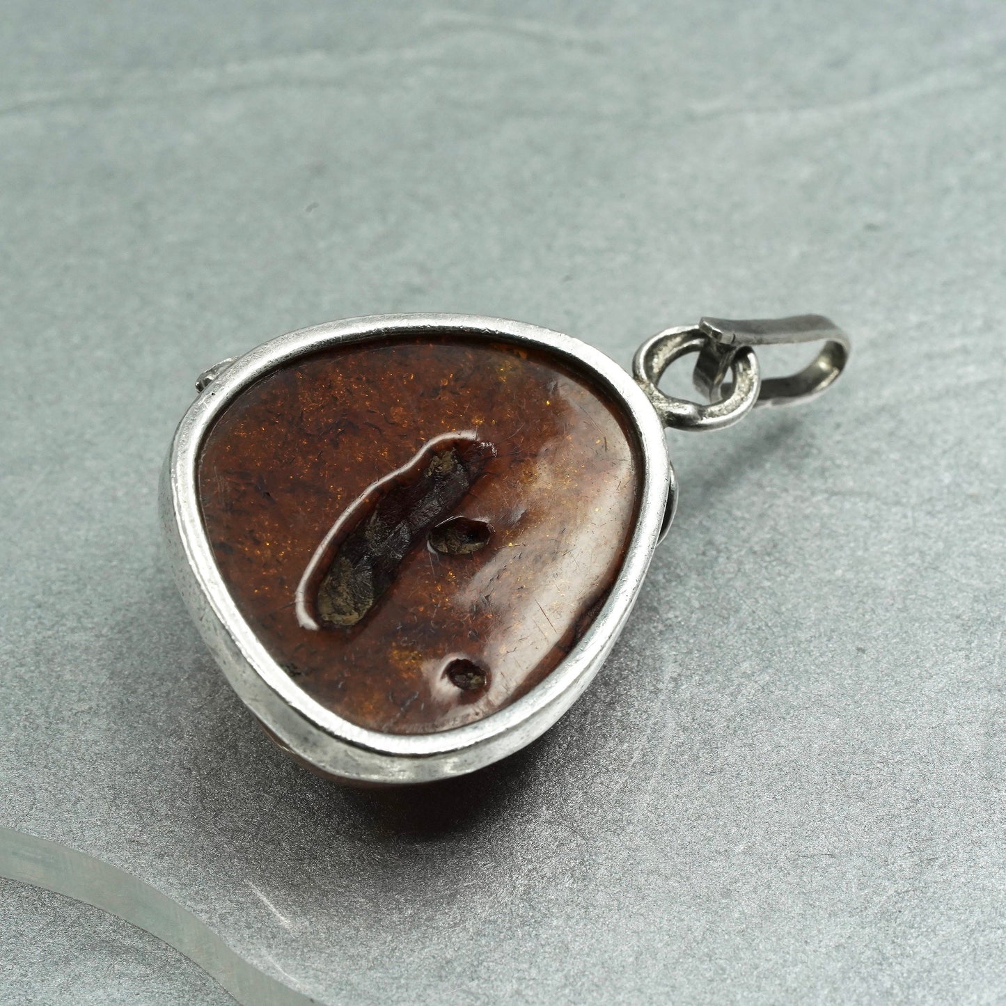 Vintage southwestern sterling 925 silver handmade pendant with amber and leaves