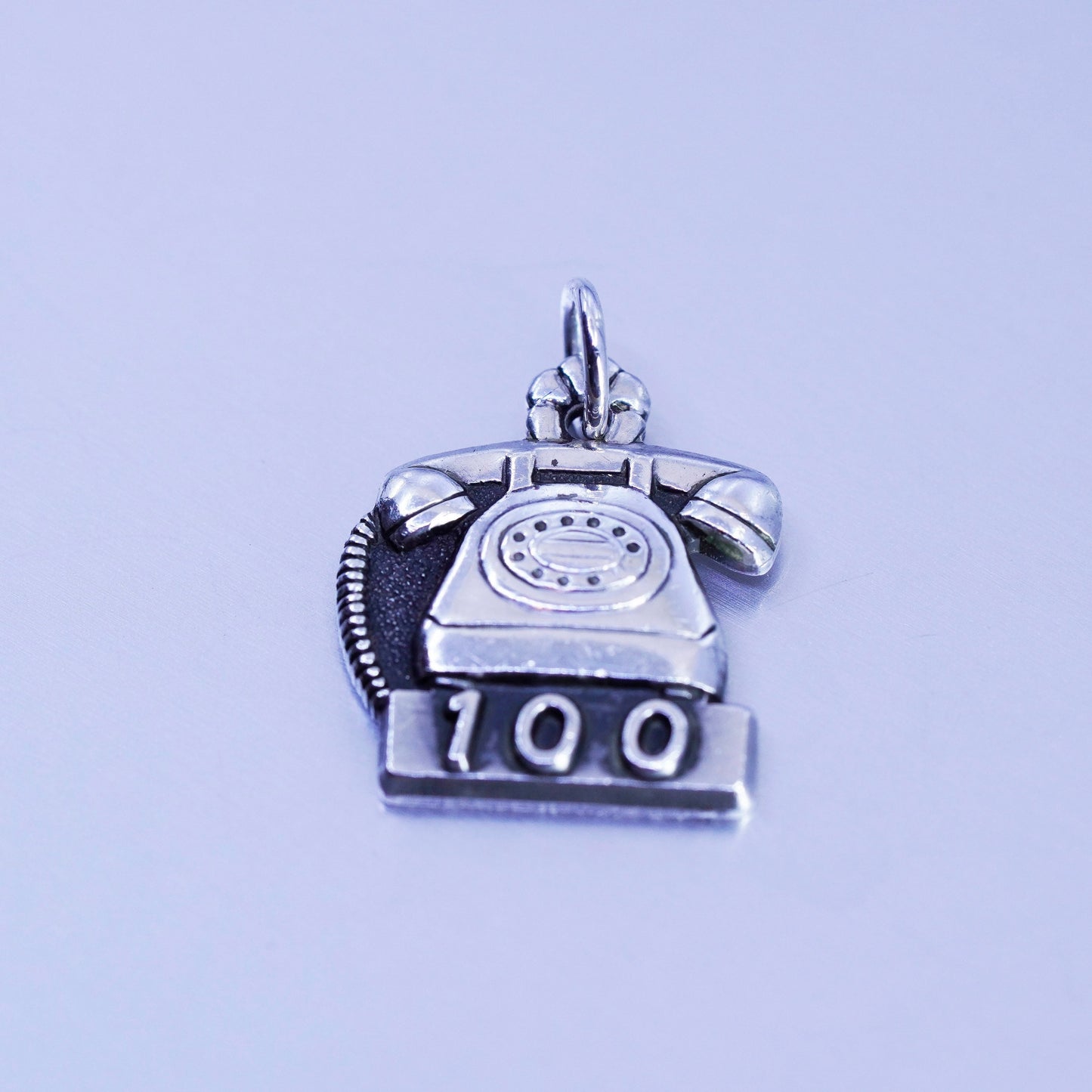 Antique Sterling silver handmade charm, 925 old fashion telephone embossed “100