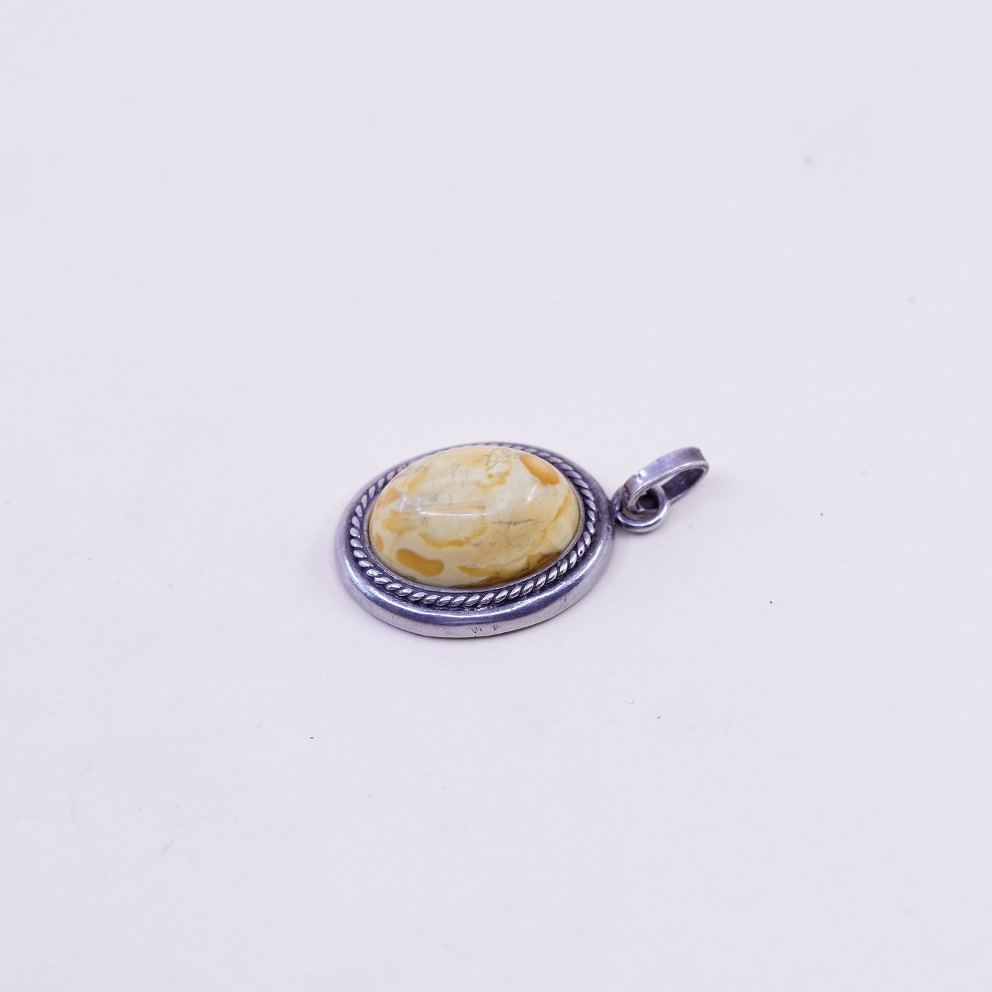 Vintage sterling 925 silver handmade pendant with oval amber