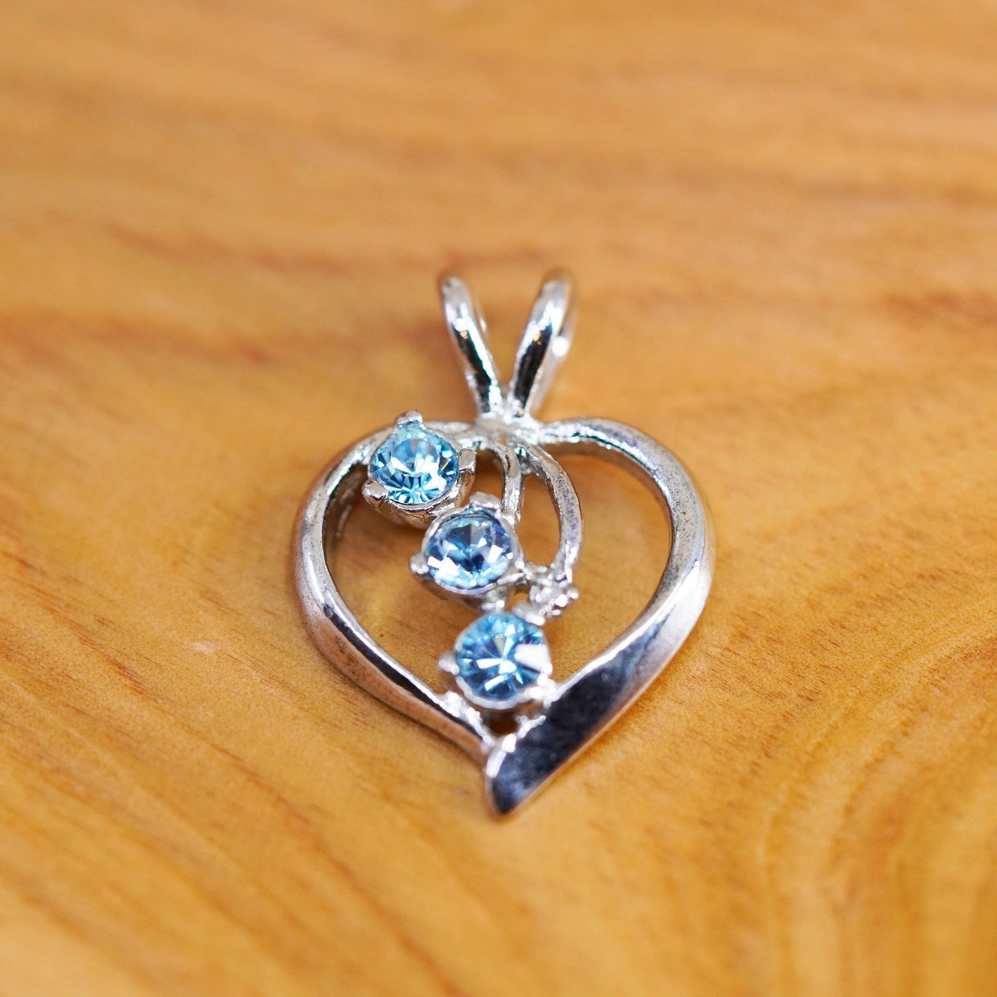 Vintage Sterling silver heart pendant with blue crystal