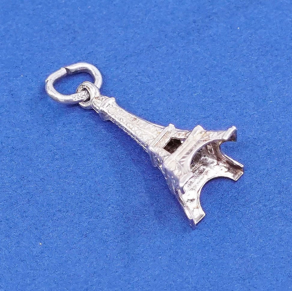 vtg Sterling silver handmade pendant. 925 skating tower charm