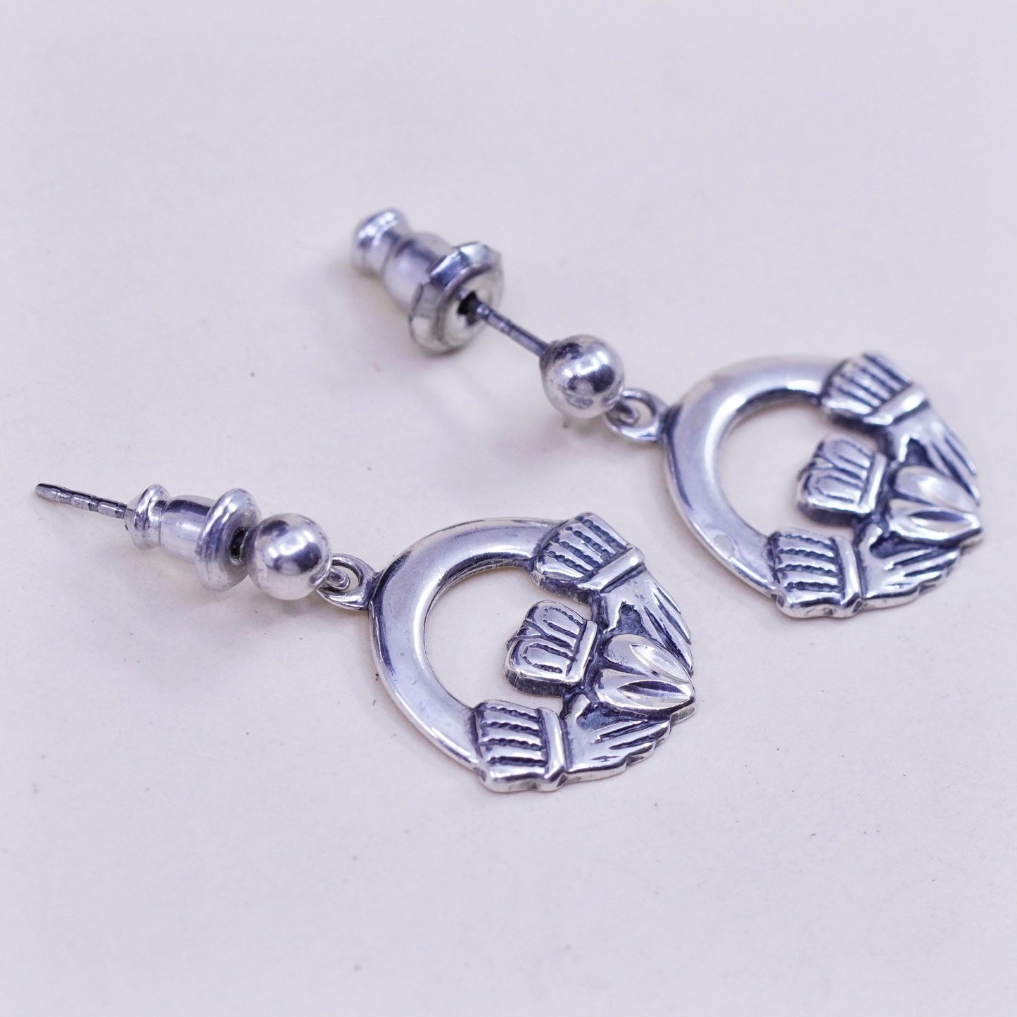 Vintage Sterling silver handmade earrings, 925 claddagh holding heart dangles