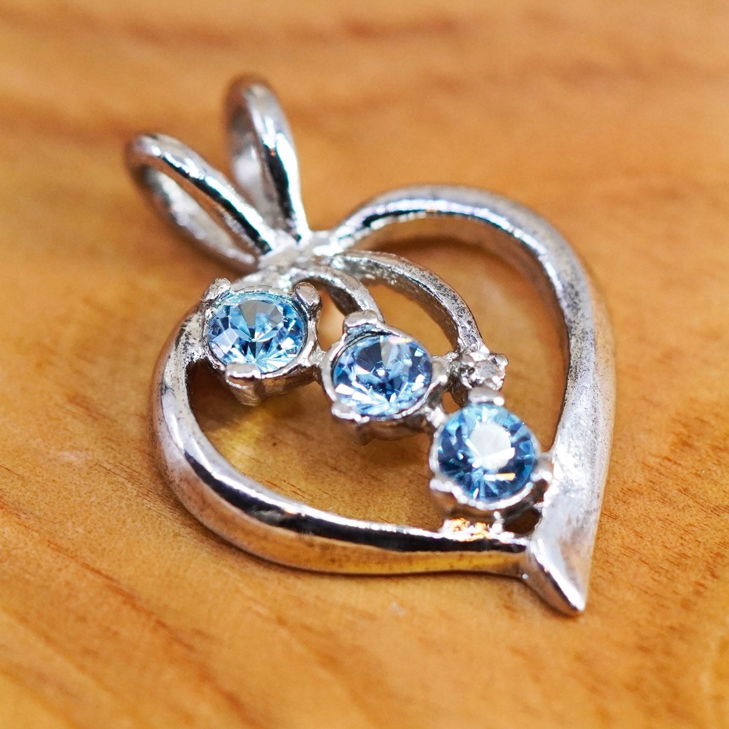 Vintage Sterling silver heart pendant with blue crystal