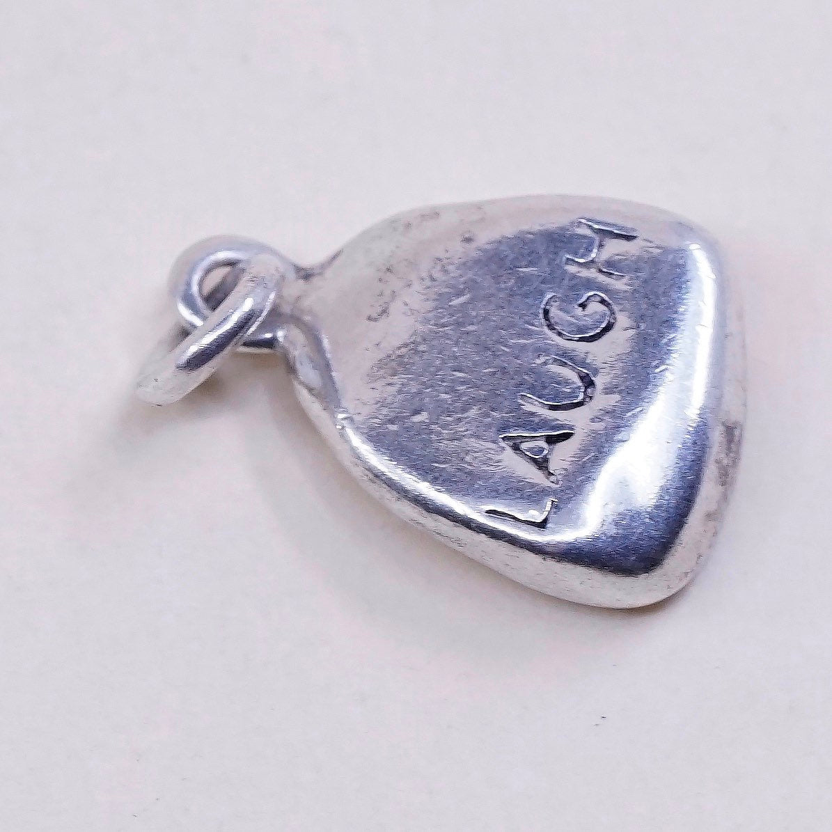 Vintage DV sterling silver Nugget charm, 925 pendant with “laugh” embossed