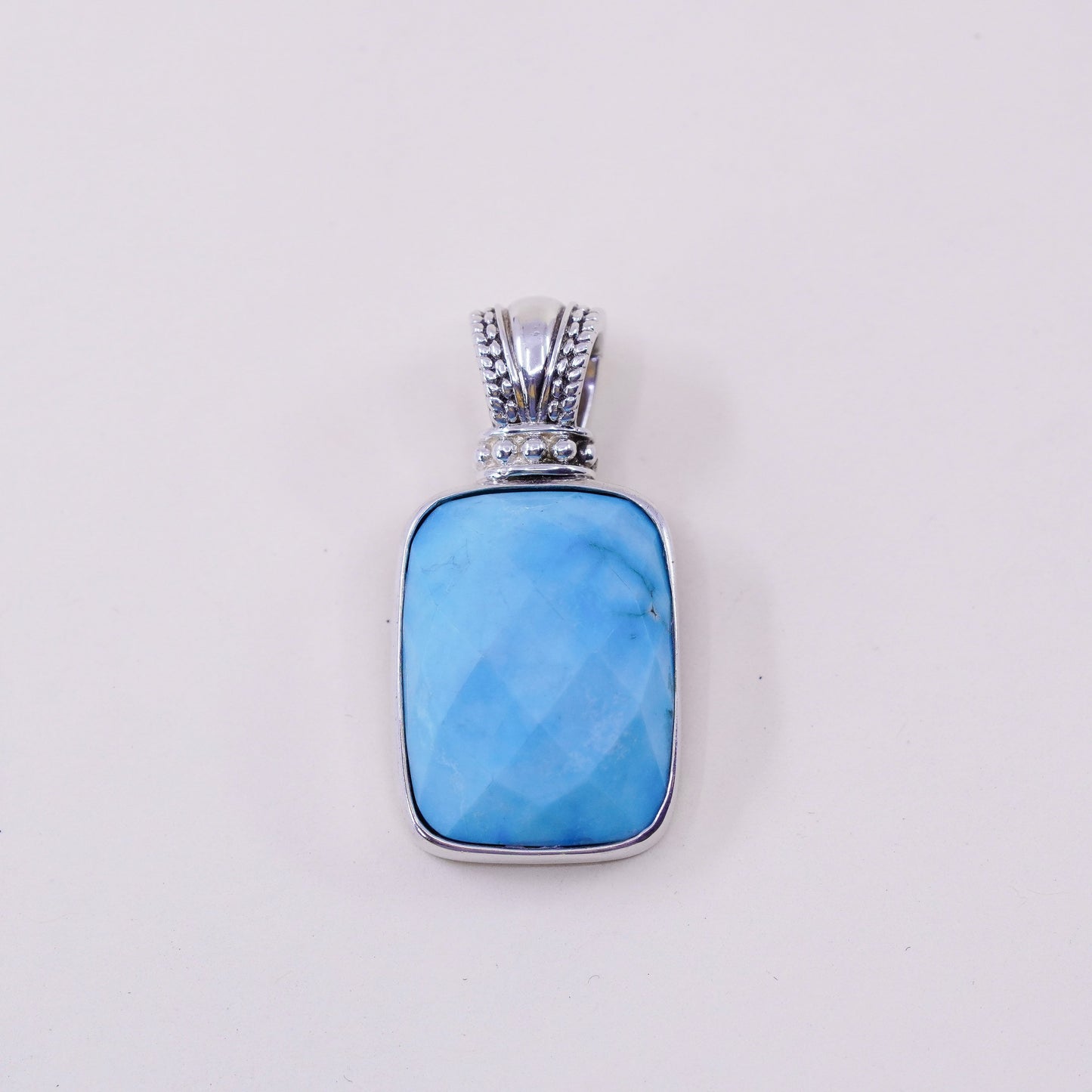 Vintage sterling silver handmade pendant, with checker cut Larimar