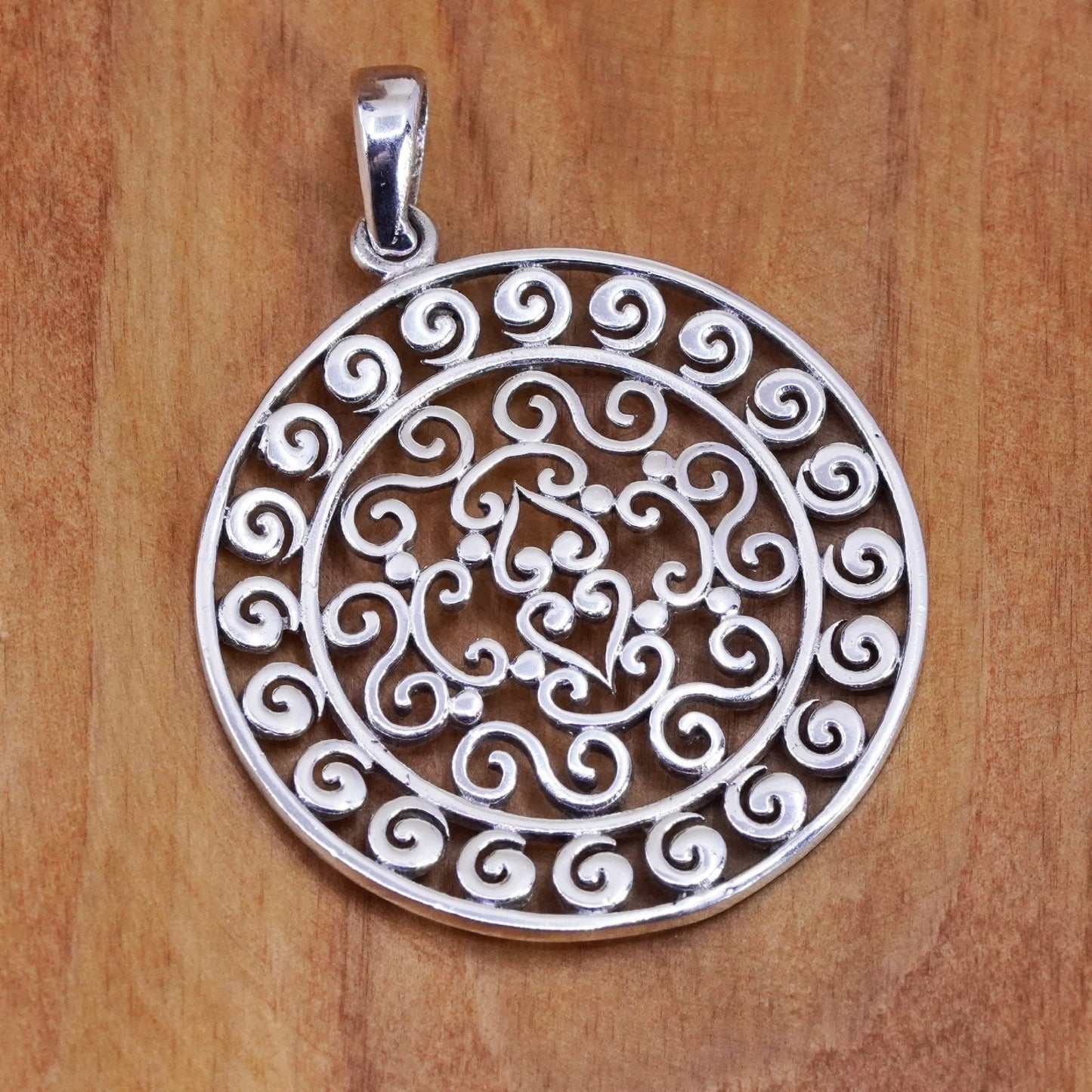 Vintage Sterling silver handmade pendant, 925 circle with Bali filigree details