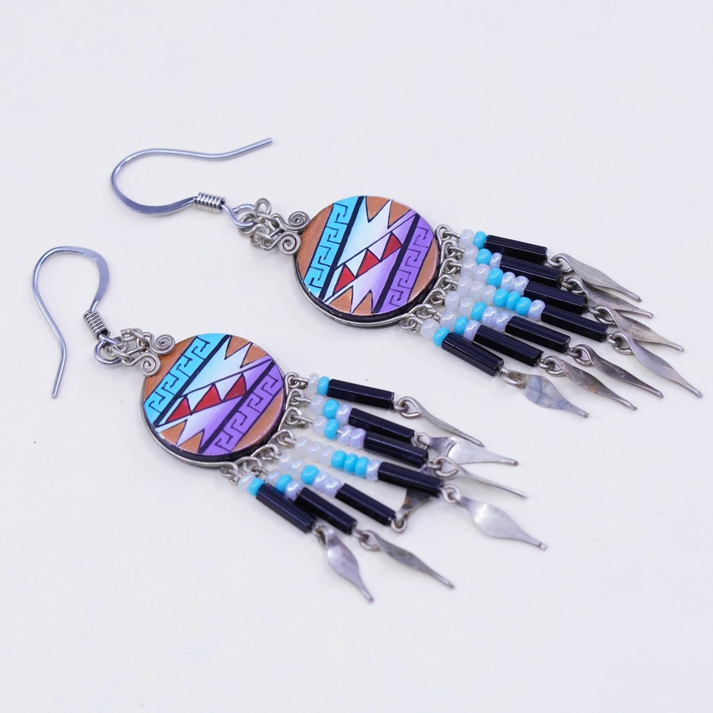 silver tone handmade earrings, ancient patterned circle with fringe