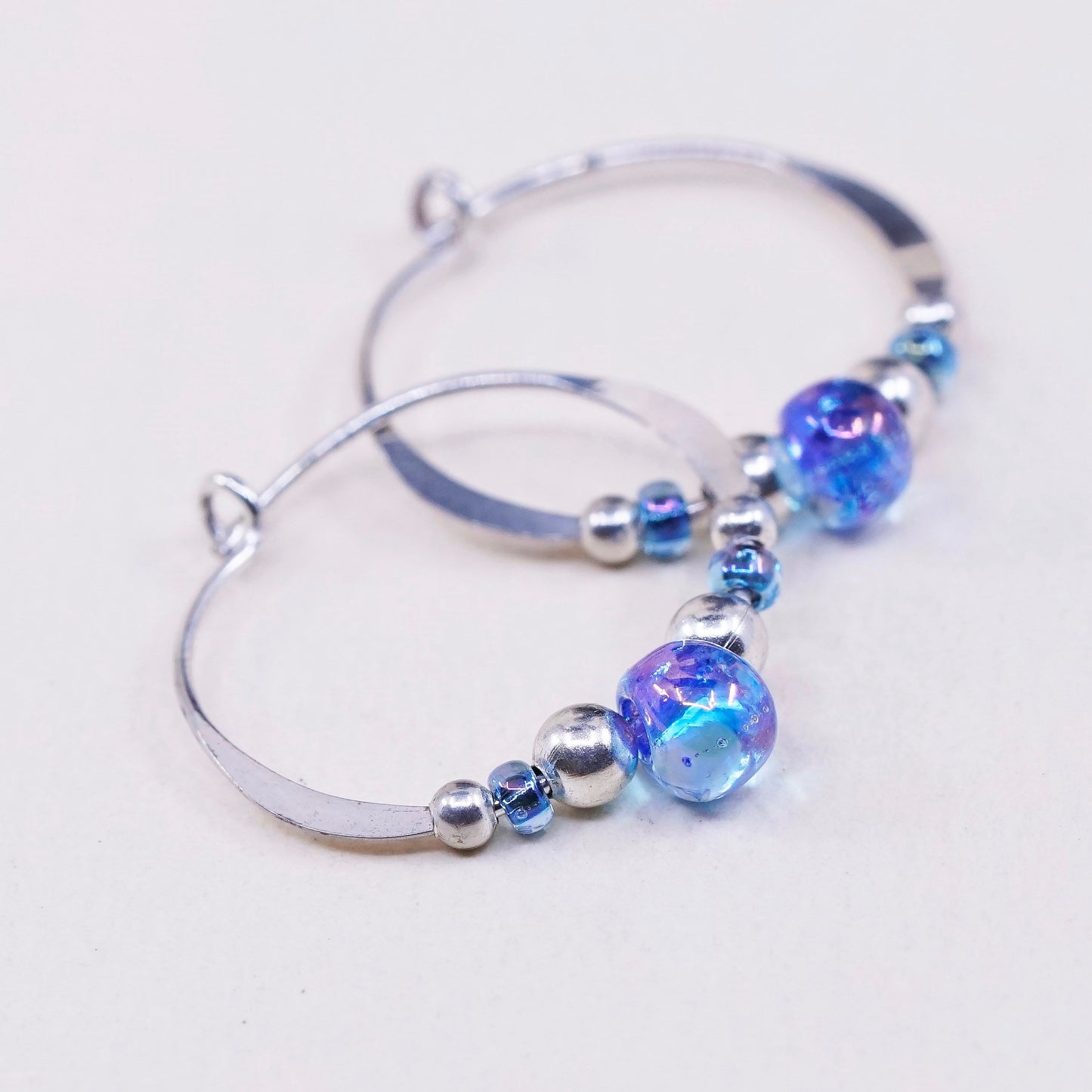 0.5”, vtg sterling silver loop earrings, minimalist primitive hoops w/ blue cz