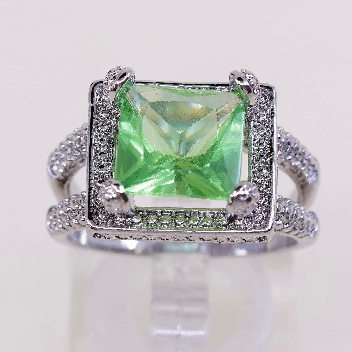sz 8.25 sterling silver ring, platinum over 925 cocktail ring w/ green n Cz