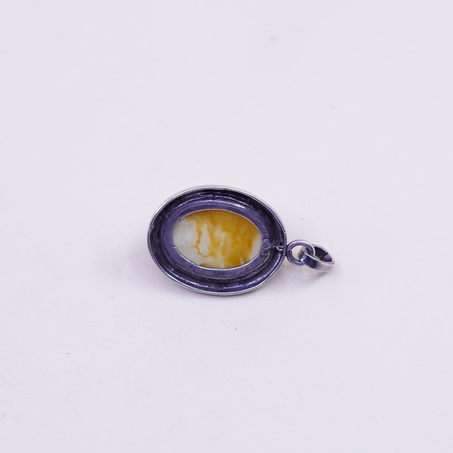 Vintage sterling 925 silver handmade pendant with oval amber