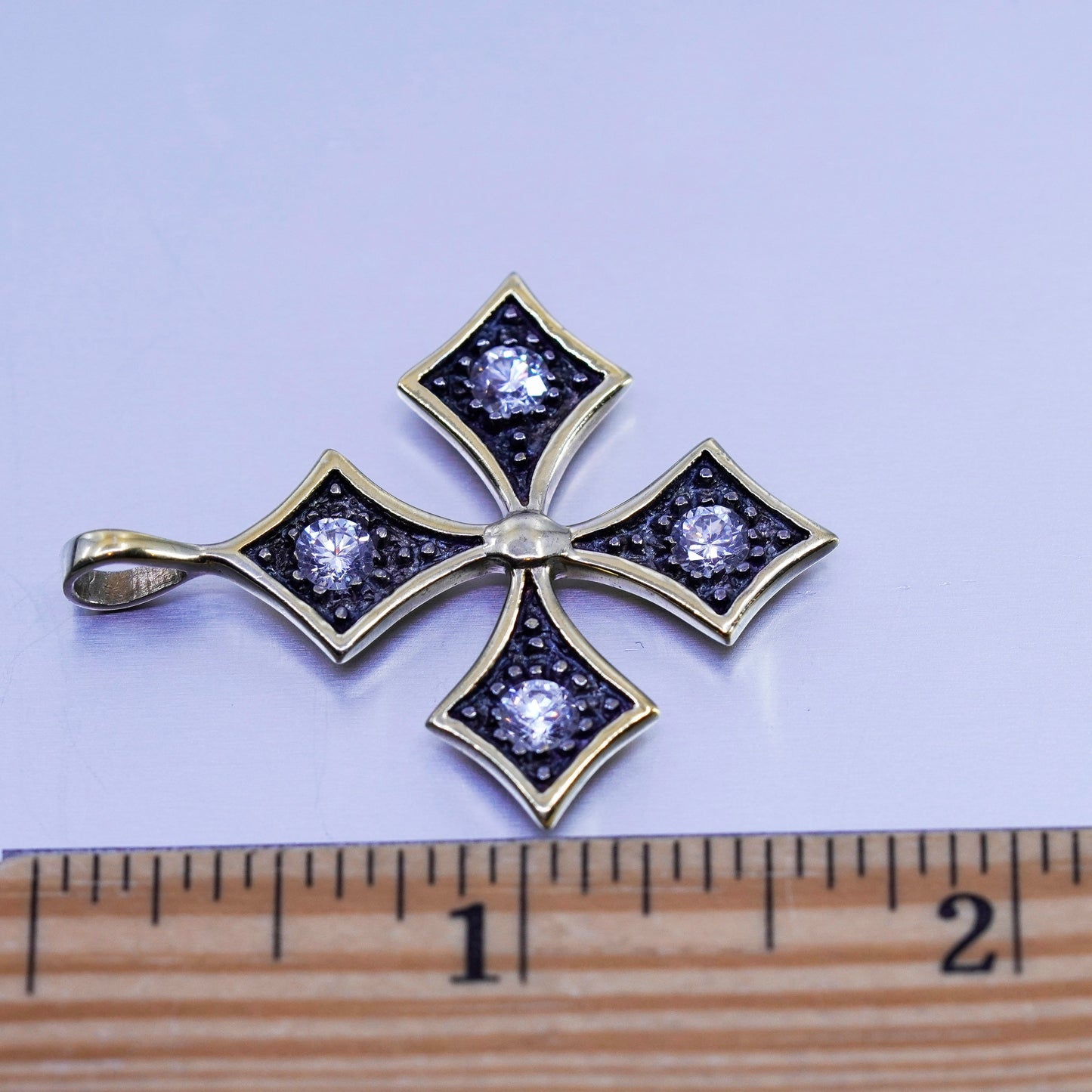 antique gold tone cross pendant with Cz