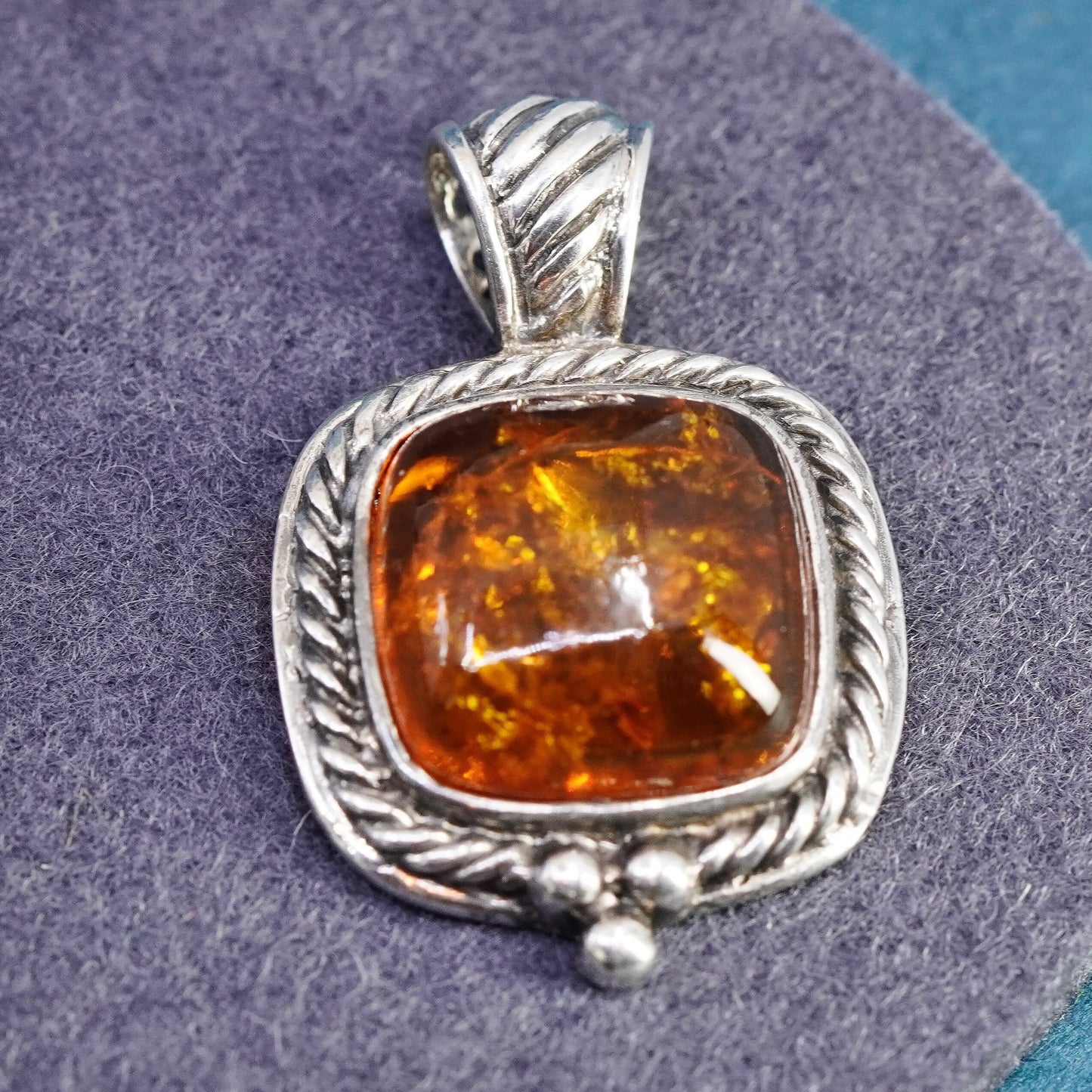 Vintage sterling silver handmade pendant, 925 resin amber and cable around