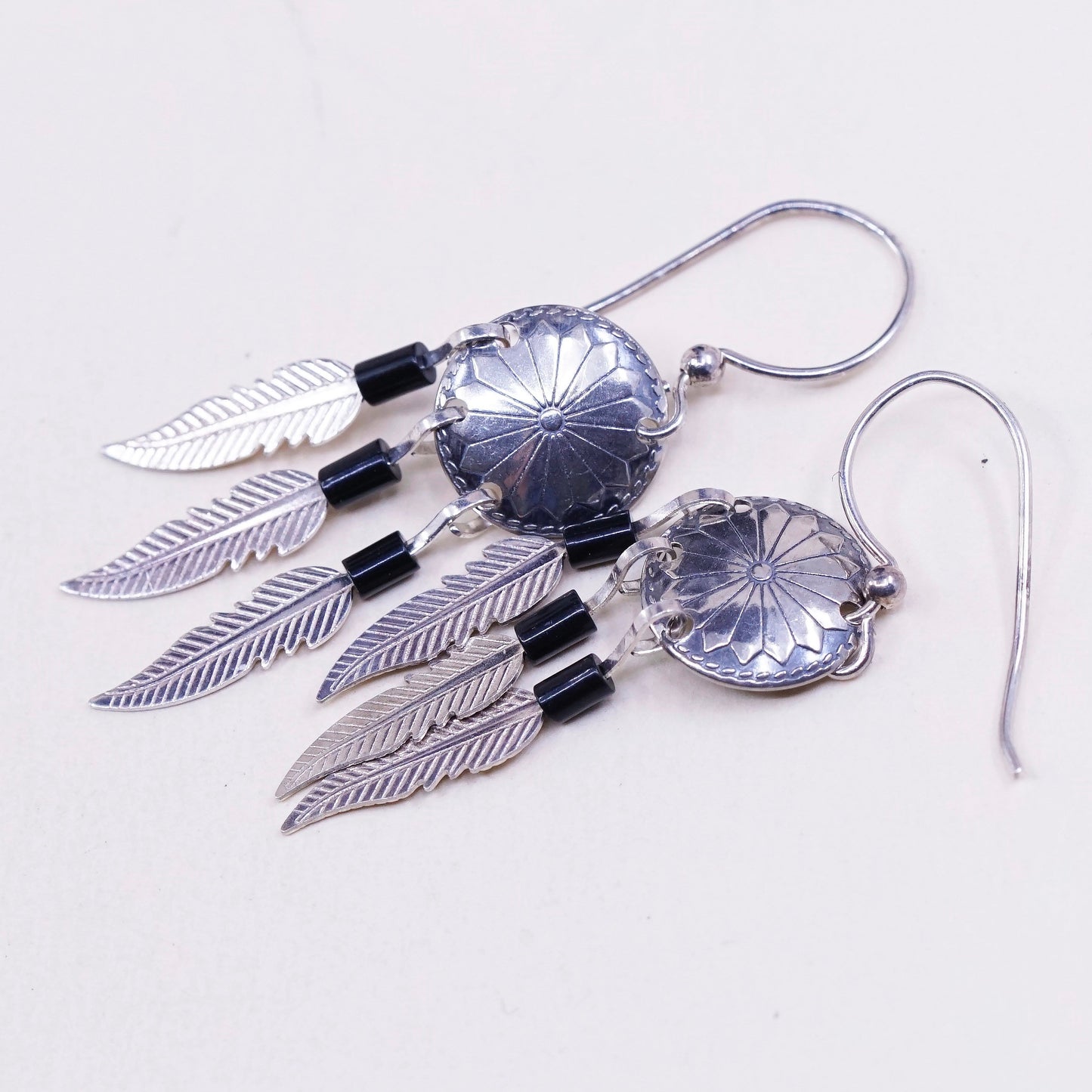 vtg USA Sterling silver handmade earrings, navajo 925 disc w/ obsidian feather