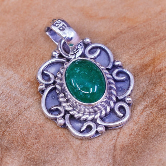 Vintage Sterling 925 silver handmade pendant with emerald and cable around