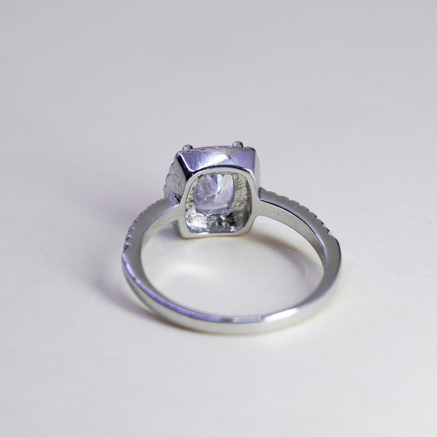 Size 8.25, Sterling 925 silver engagement ring w/ emerald cut CZ and cluster cz