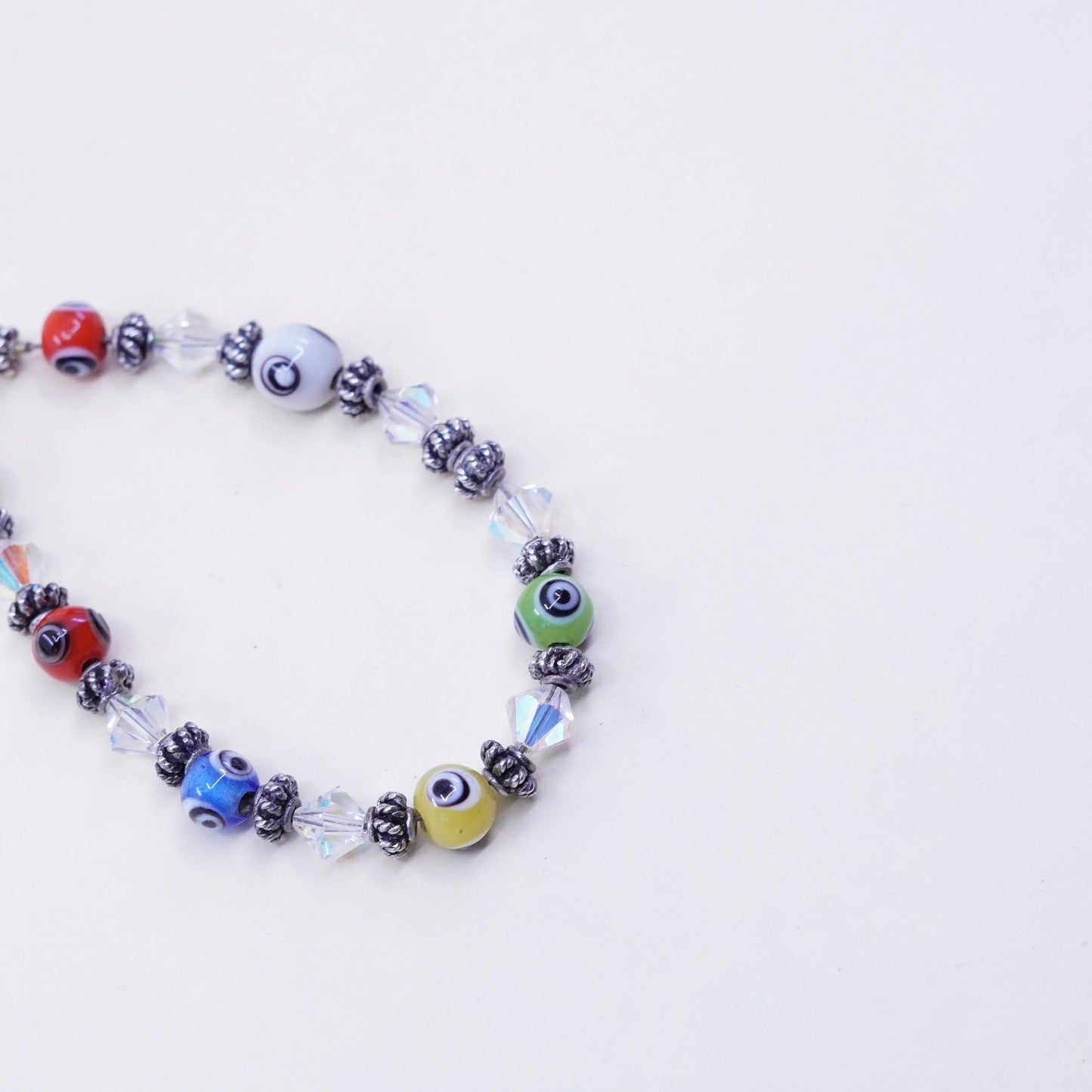 7”, handmade sterling silver bracelet, glass evil eye beads and heart closure