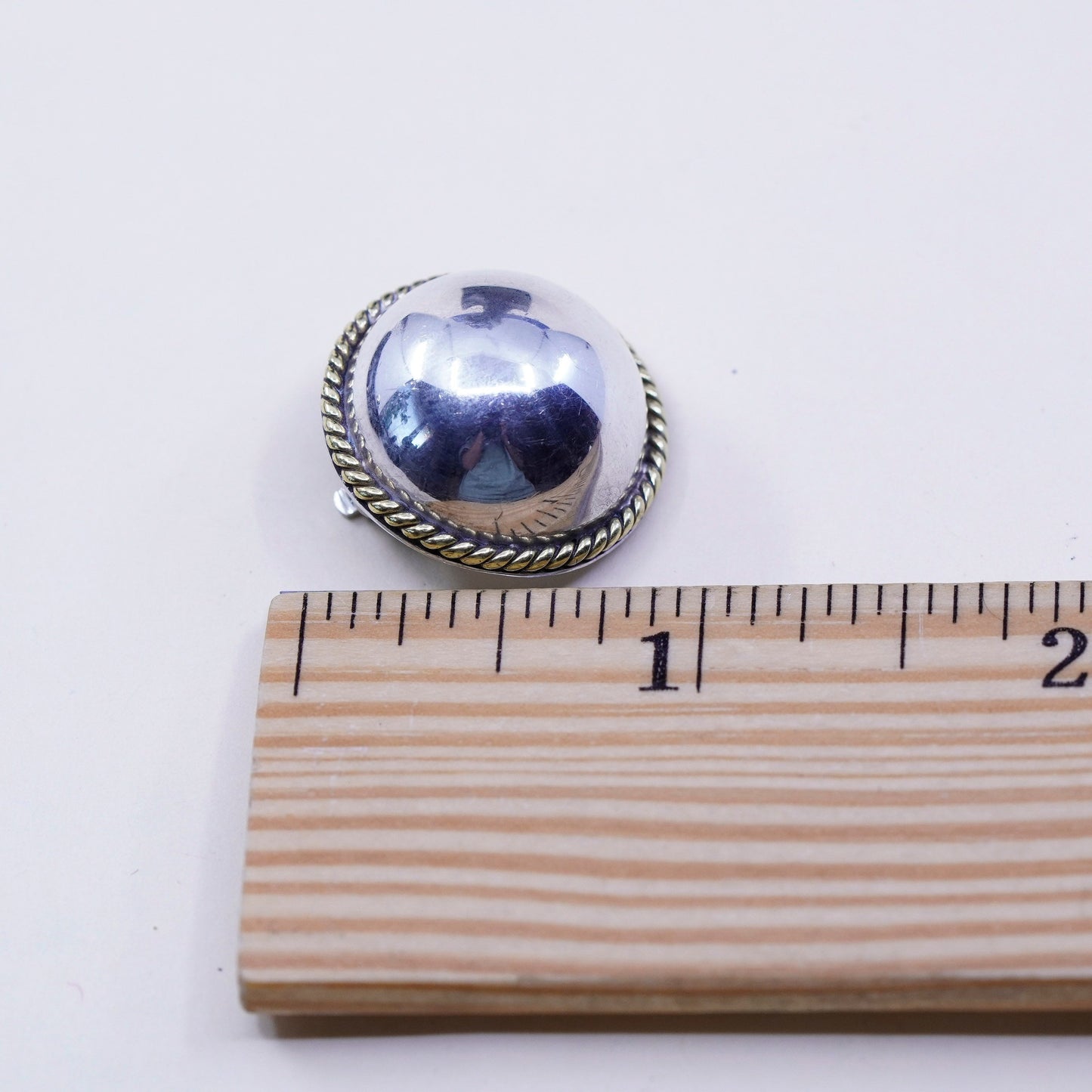 1”, vtg two tone Sterling 925 silver clip on earrings with brass cable around