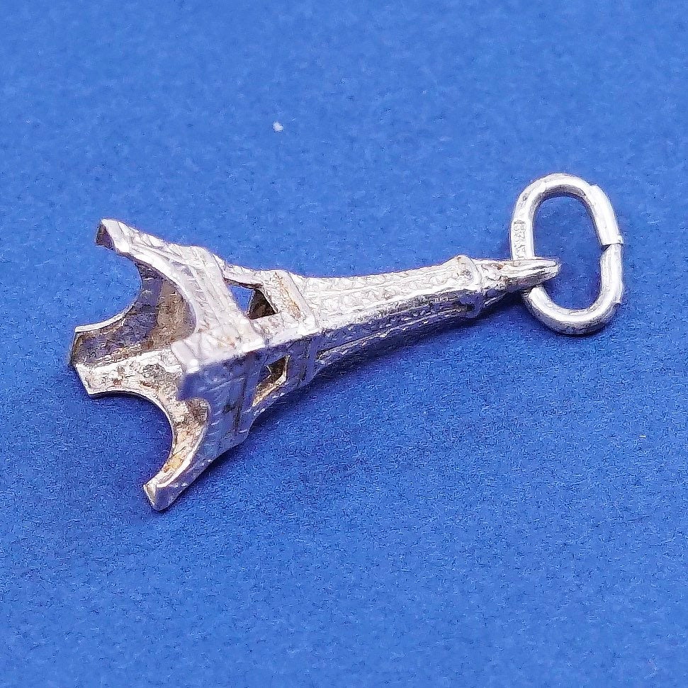 vtg Sterling silver handmade pendant. 925 skating tower charm