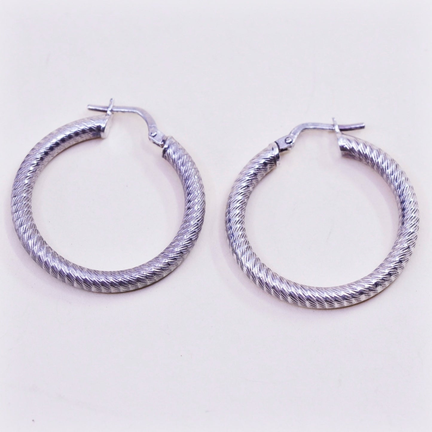 1” Vintage sterling silver loop earrings, textured primitive hoops