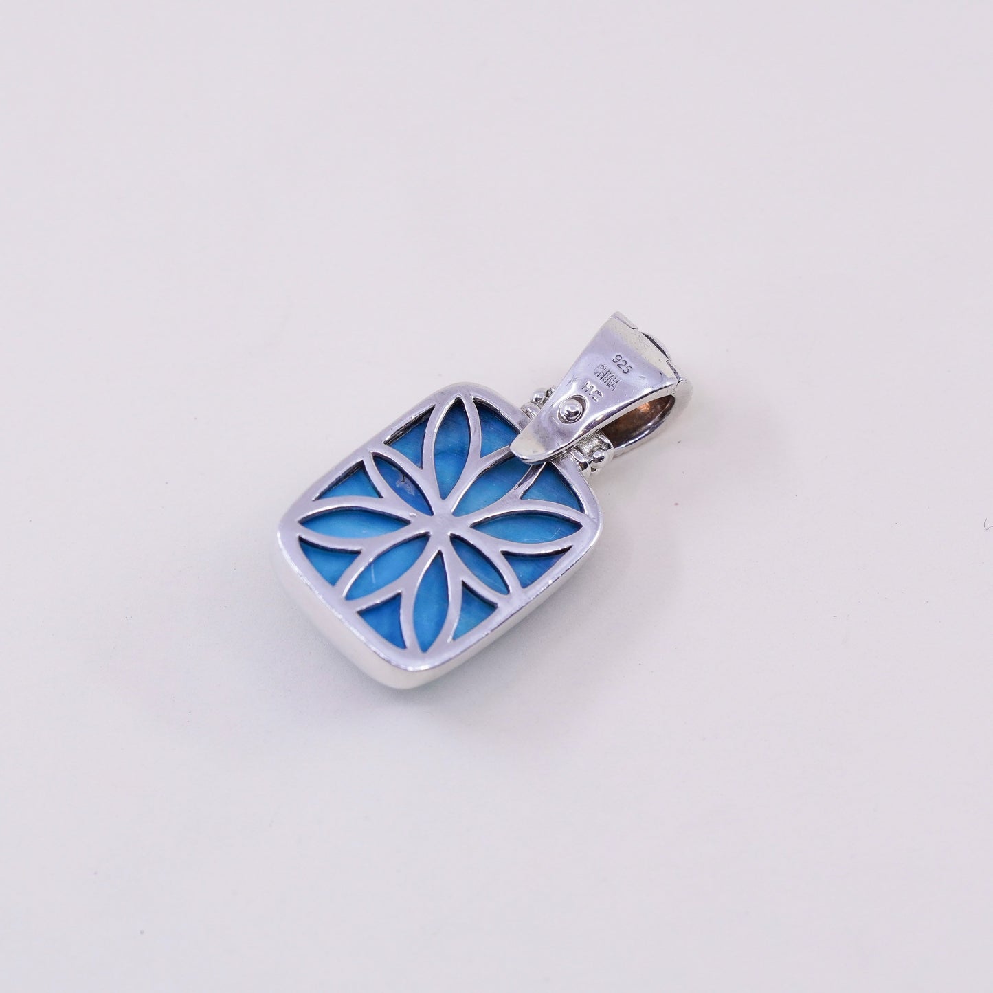 Vintage sterling silver handmade pendant, with checker cut Larimar