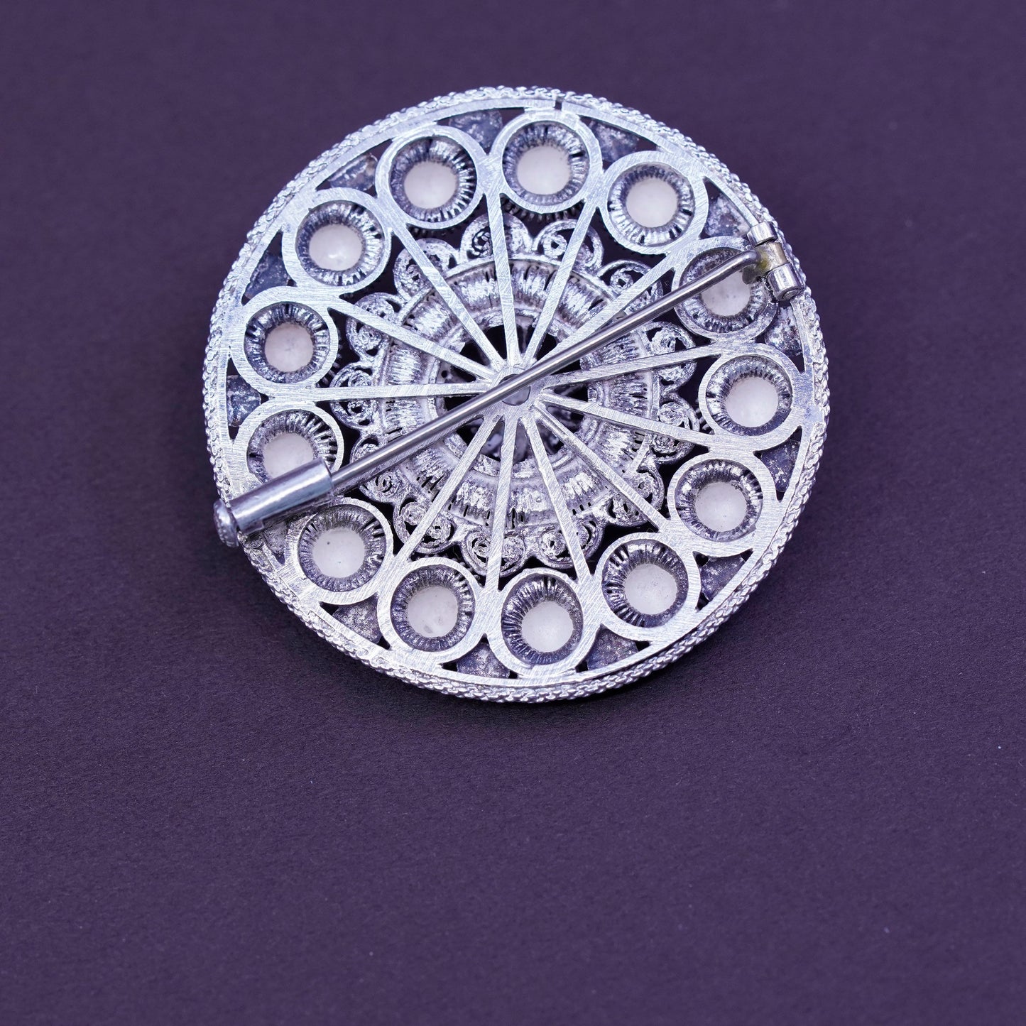 Vintage handmade sterling silver round shaped filigree bead brooch
