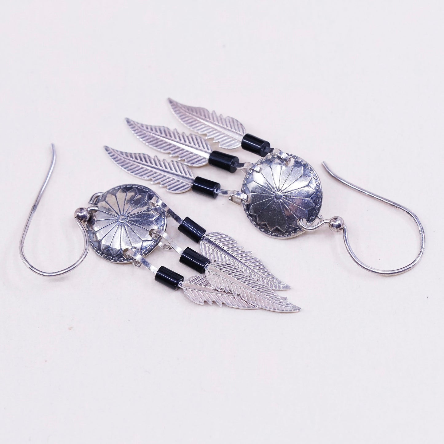 vtg USA Sterling silver handmade earrings, navajo 925 disc w/ obsidian feather