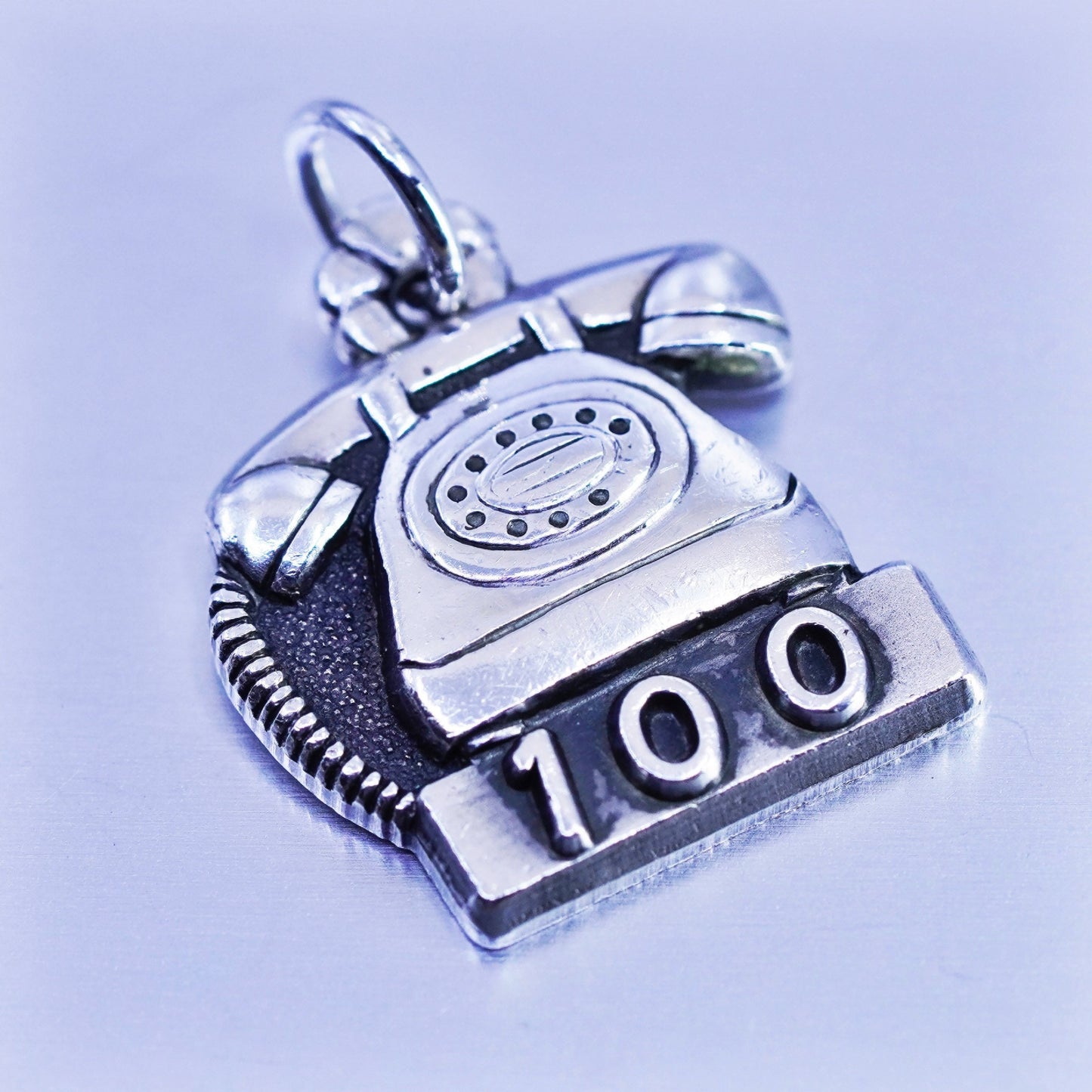 Antique Sterling silver handmade charm, 925 old fashion telephone embossed “100