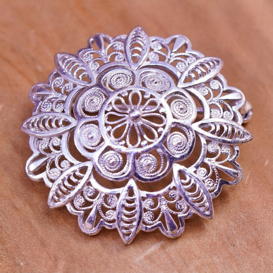 Vintage handmade sterling silver round shaped filigree floral brooch