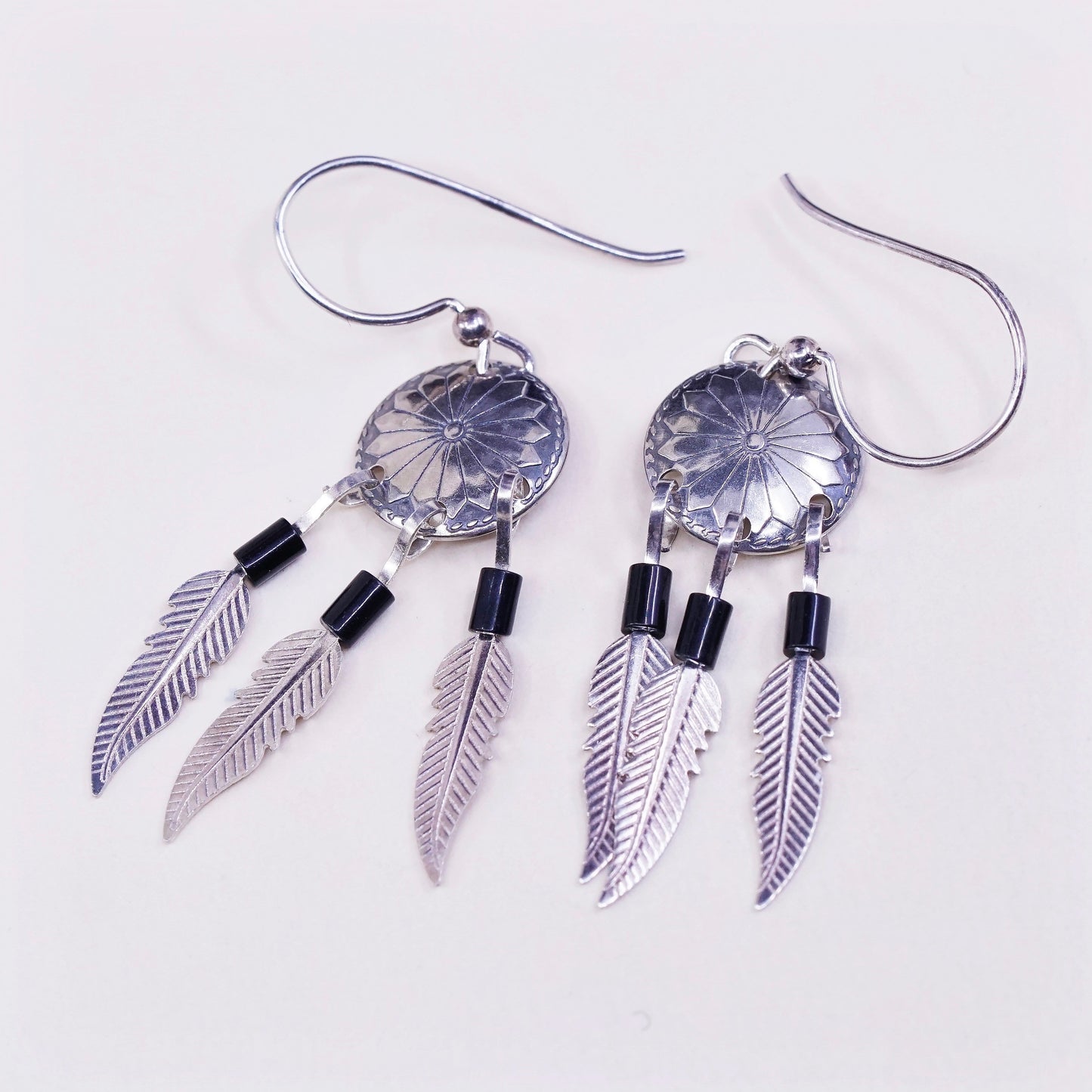 vtg USA Sterling silver handmade earrings, navajo 925 disc w/ obsidian feather