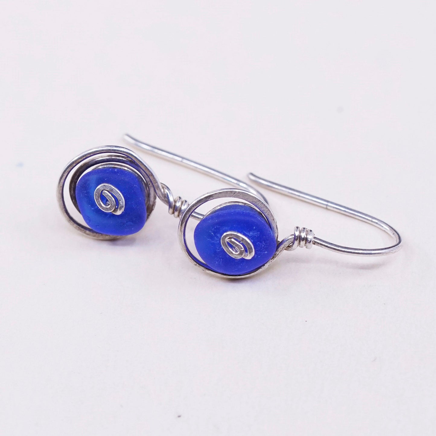 vtg Sterling silver handmade earrings, 925 swirl with blue glass drops