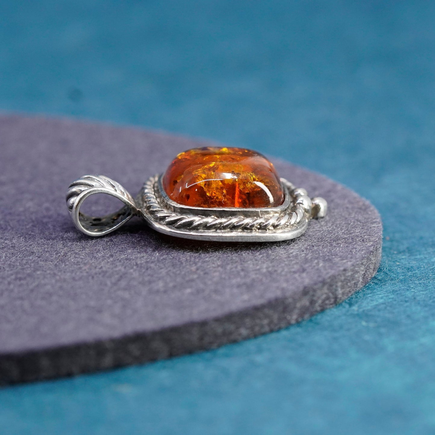 Vintage sterling silver handmade pendant, 925 resin amber and cable around