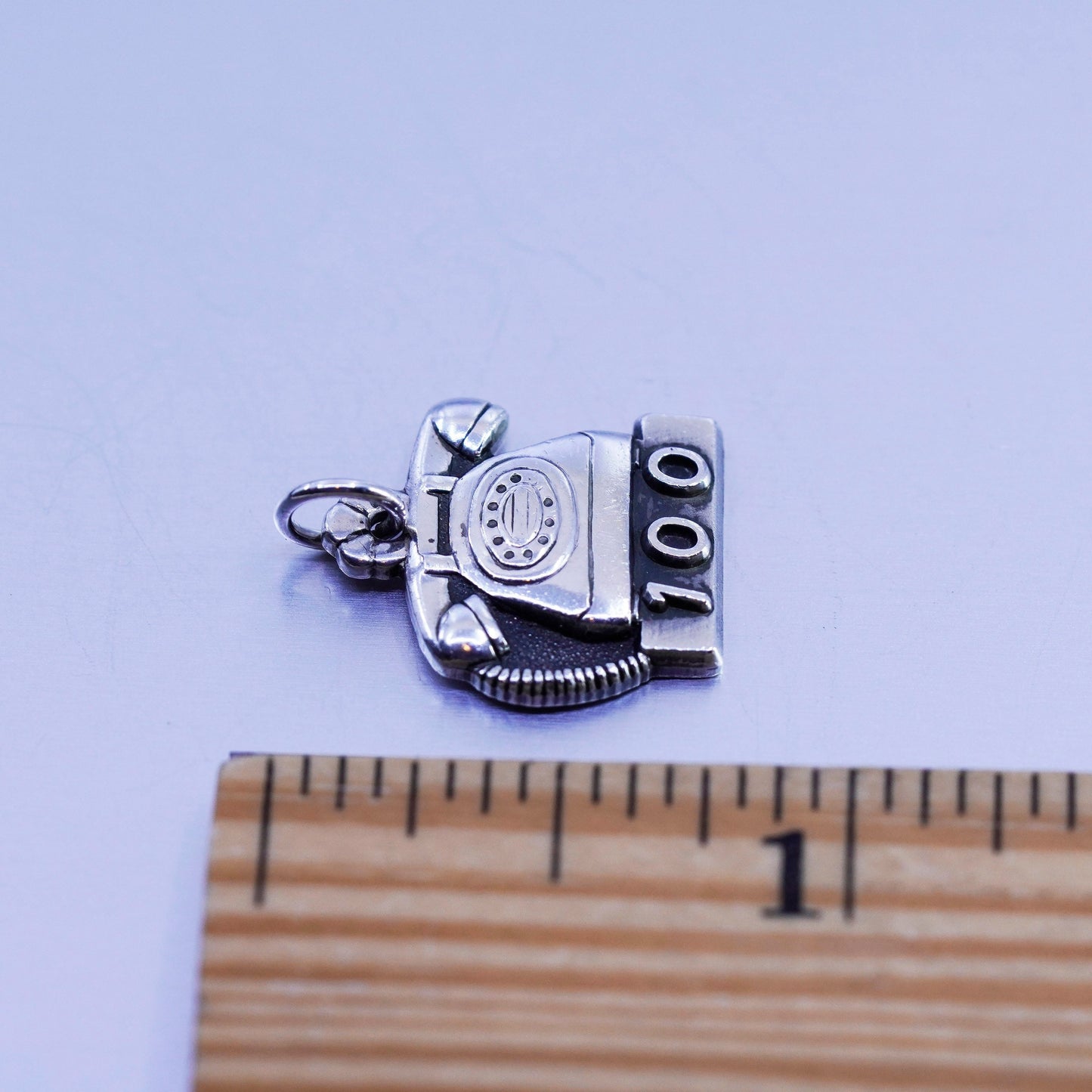 Antique Sterling silver handmade charm, 925 old fashion telephone embossed “100