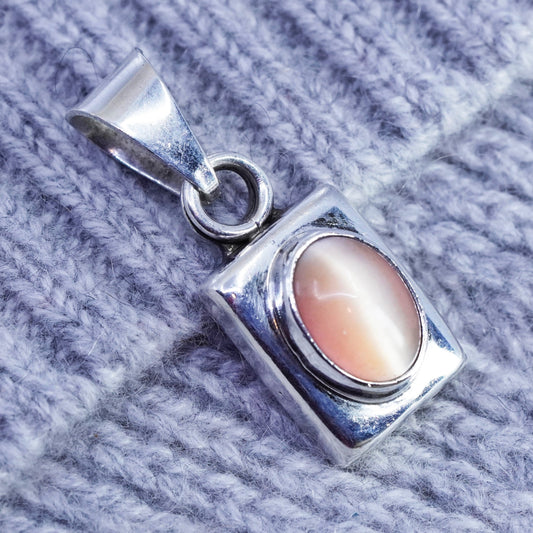 Vintage sterling 925 silver handmade pendant with oval orange cat’s eye