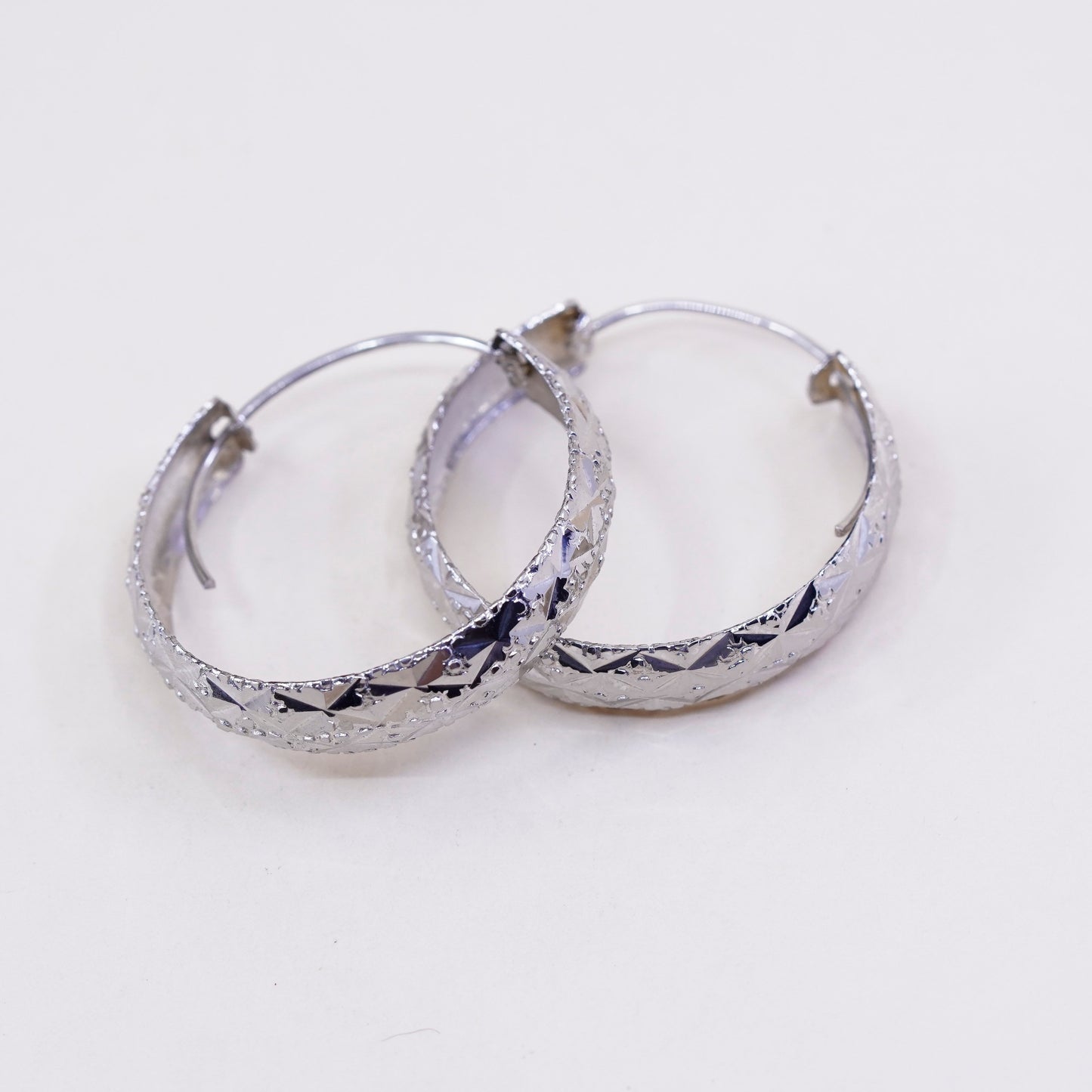 1.25”, Vintage sterling silver loop earrings, textured primitive hoops
